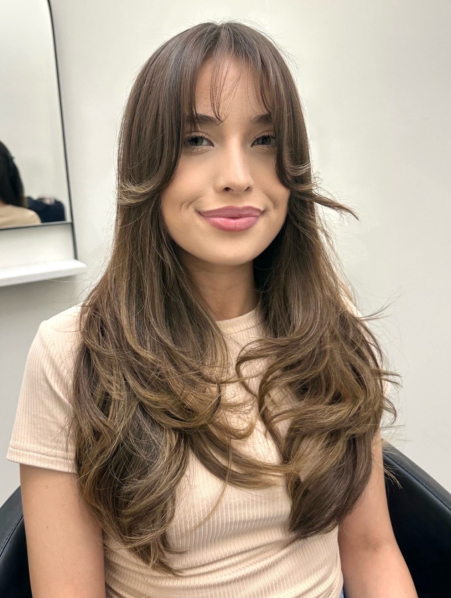 Chic Layered Cut with Soft Bangs