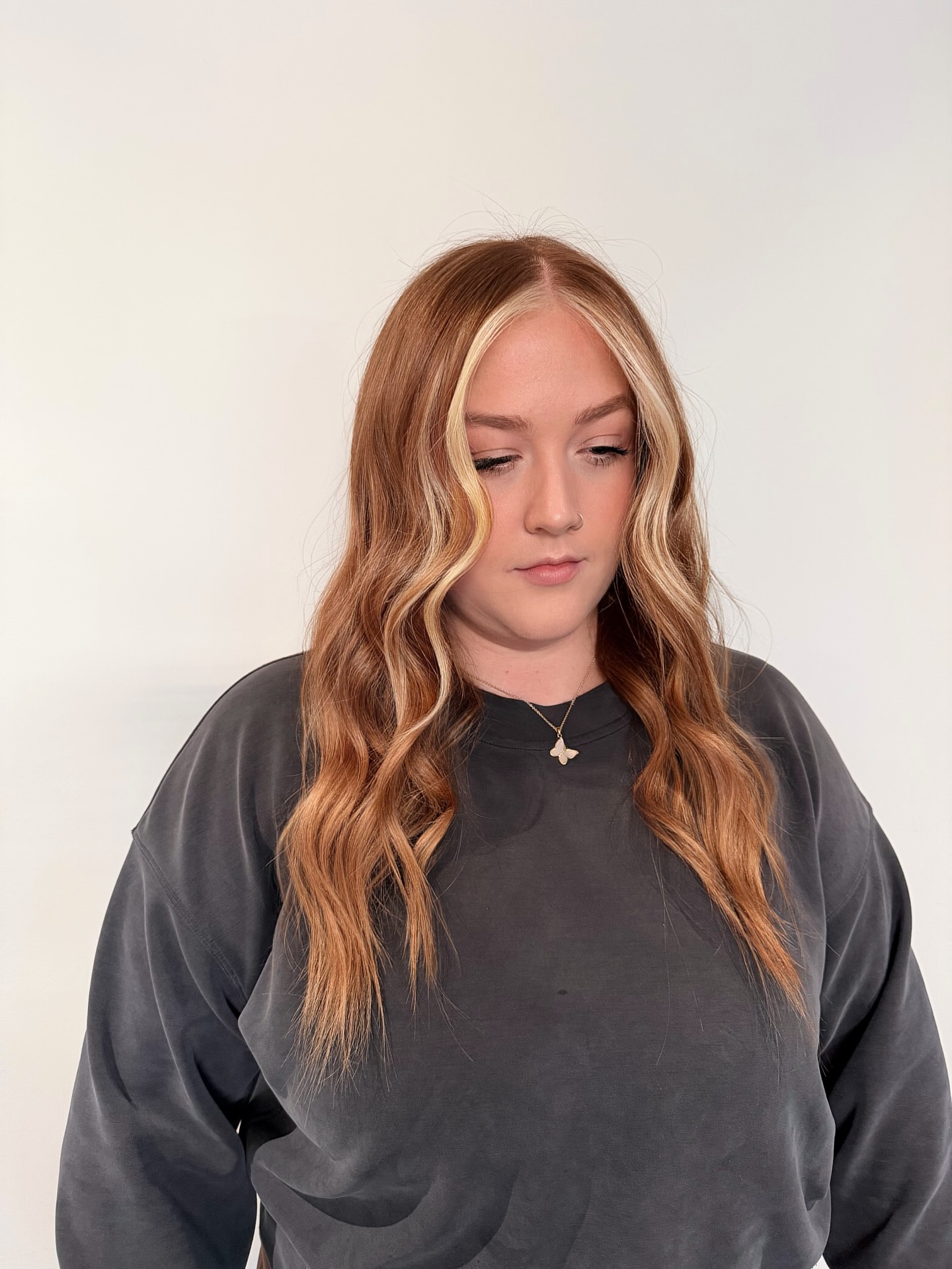Chic Long Layered Waves with Subtle Highlights