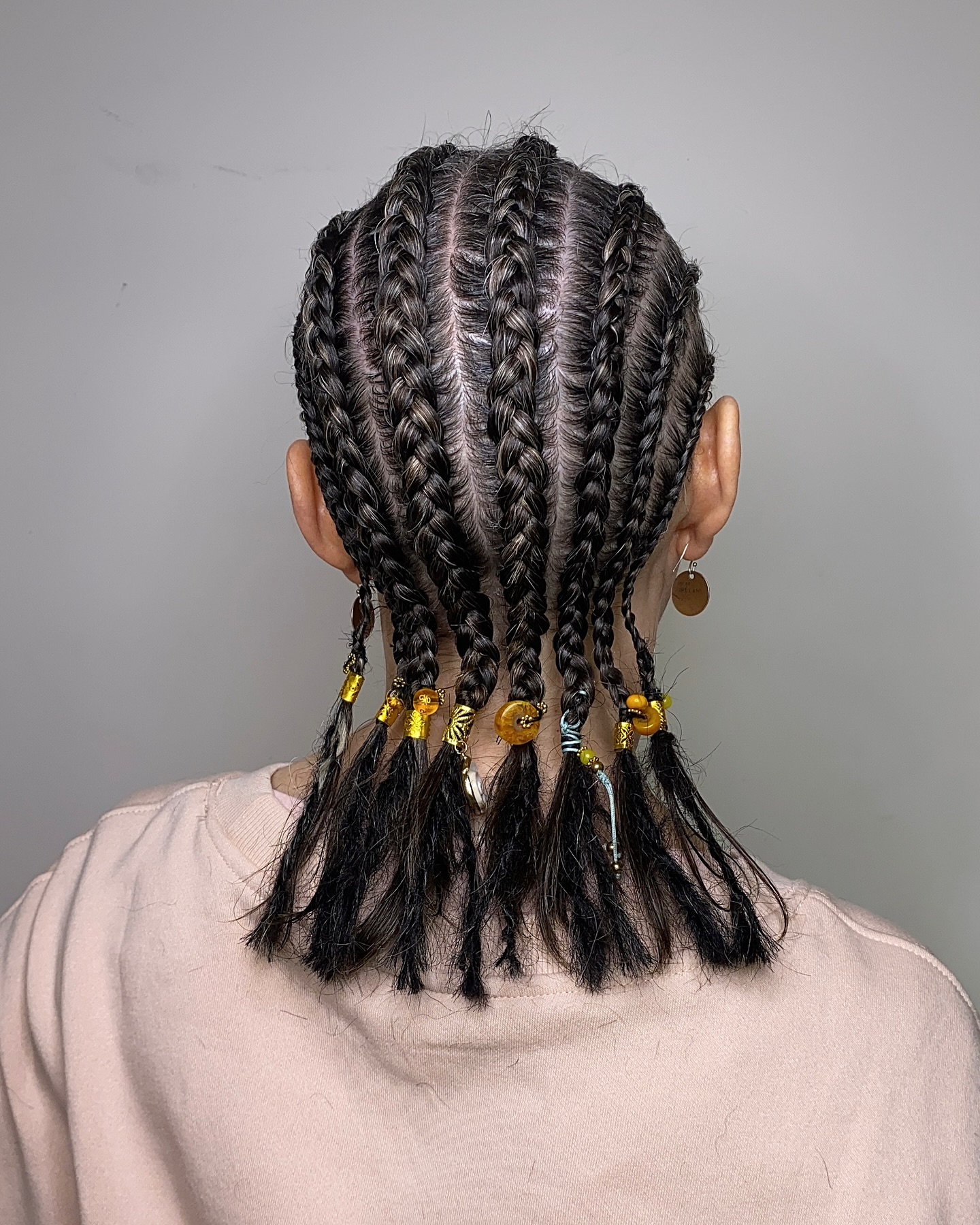 Creative Cornrow Braids with Decorative Beads