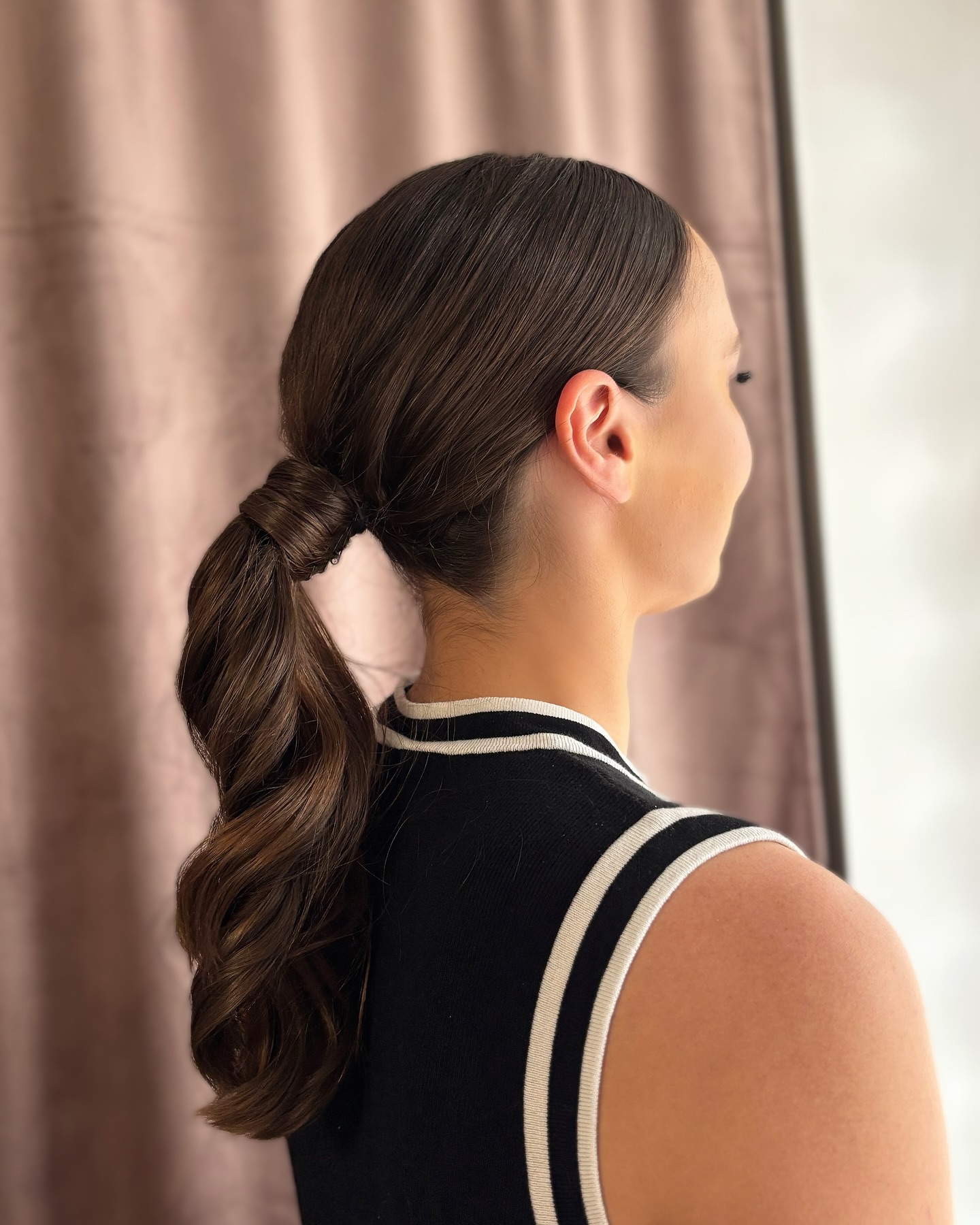 Sleek Textured Ponytail with Soft Waves