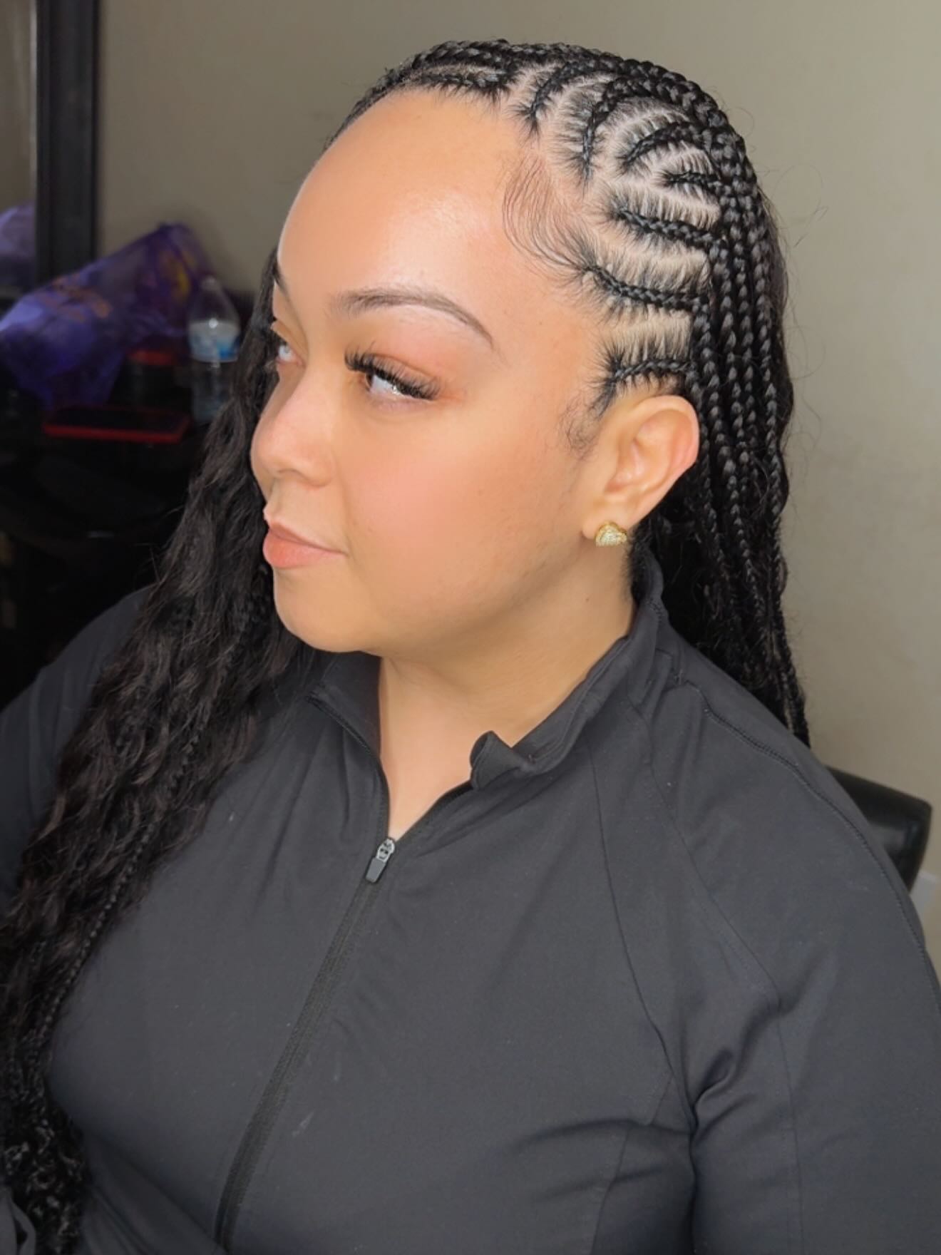 Stylish Cornrow Braids with Loose Curls