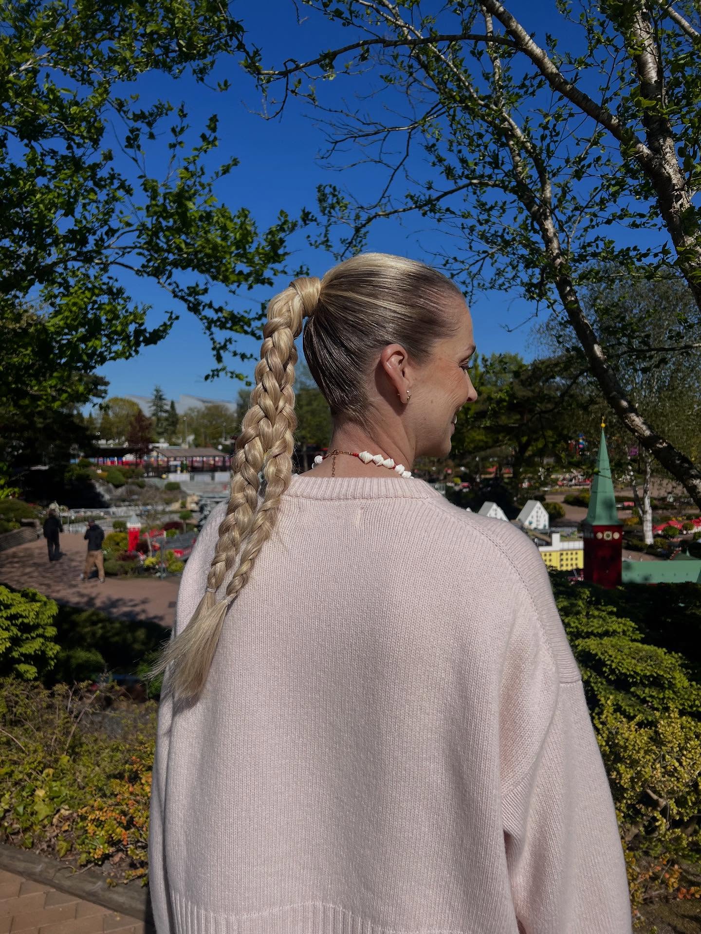 Elegant High Braid with Subtle Highlights