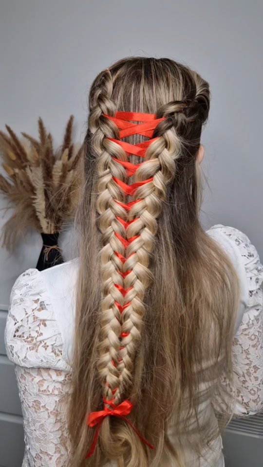 Charming Laced Dutch Braid with Playful Ribbon Accents