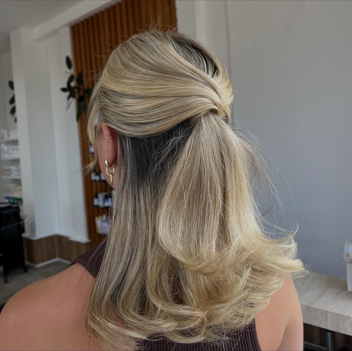 Chic Half-Up Style with Soft Curls
