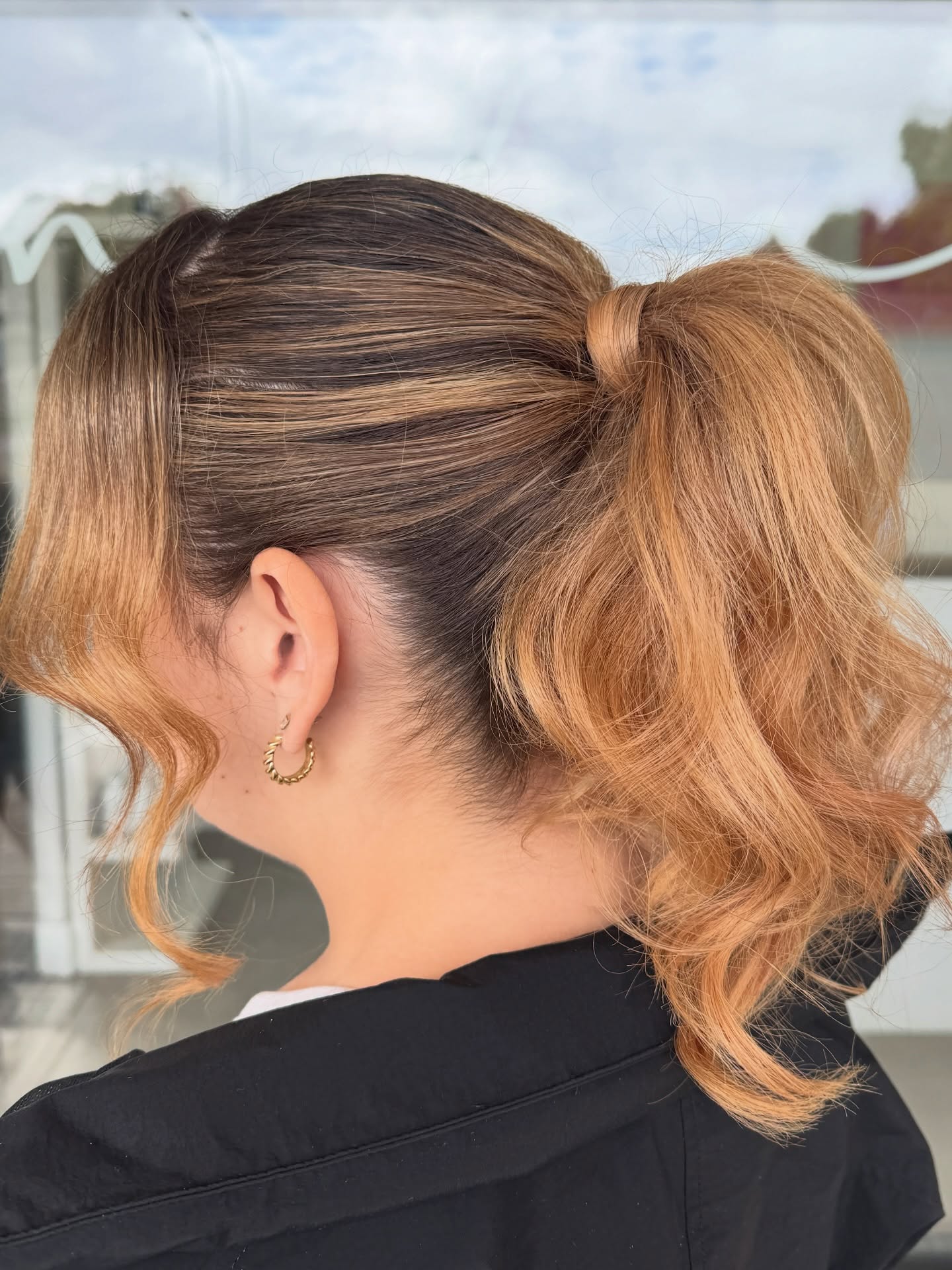 Textured High Ponytail with Soft Waves