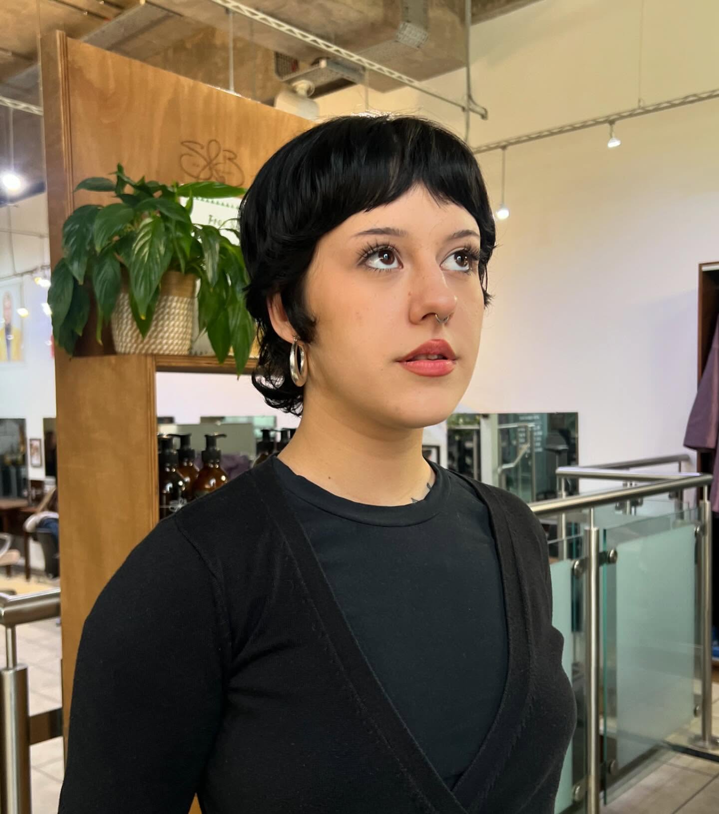 Chic Curly Pixie Cut with Soft Bangs