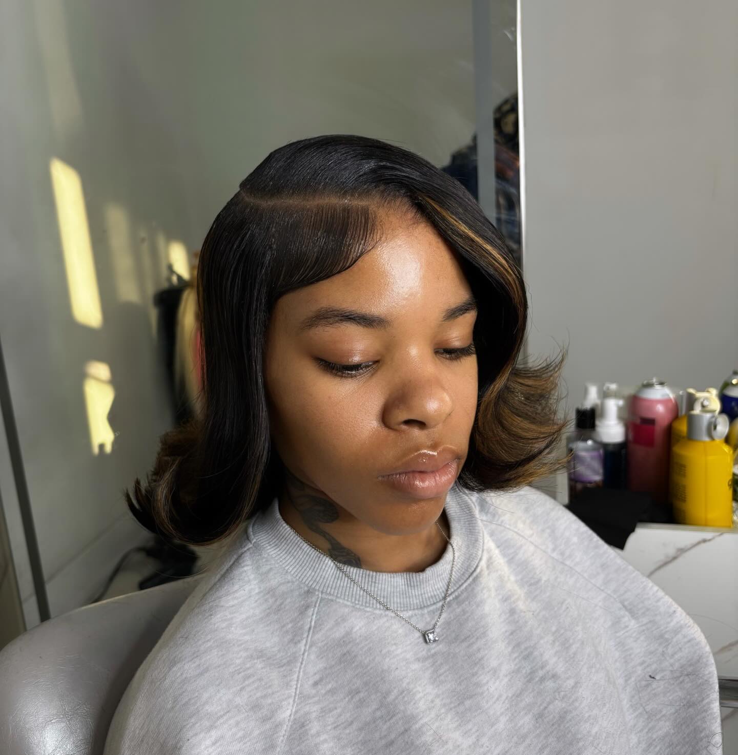 Classic Side-Parted Curly Bob with Soft Highlights