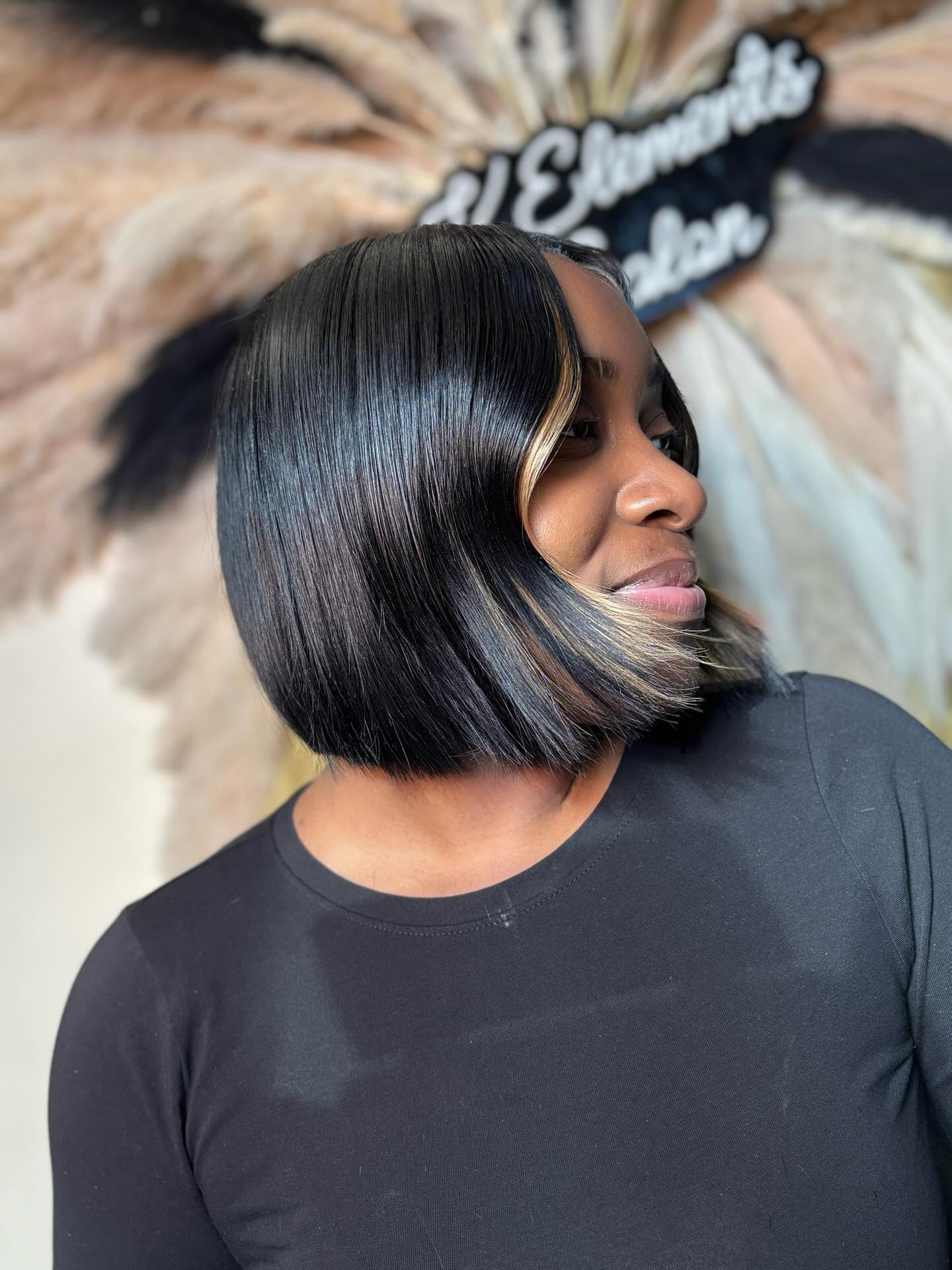 Modern Glossy Blunt Cut Bob with Subtle Highlights
