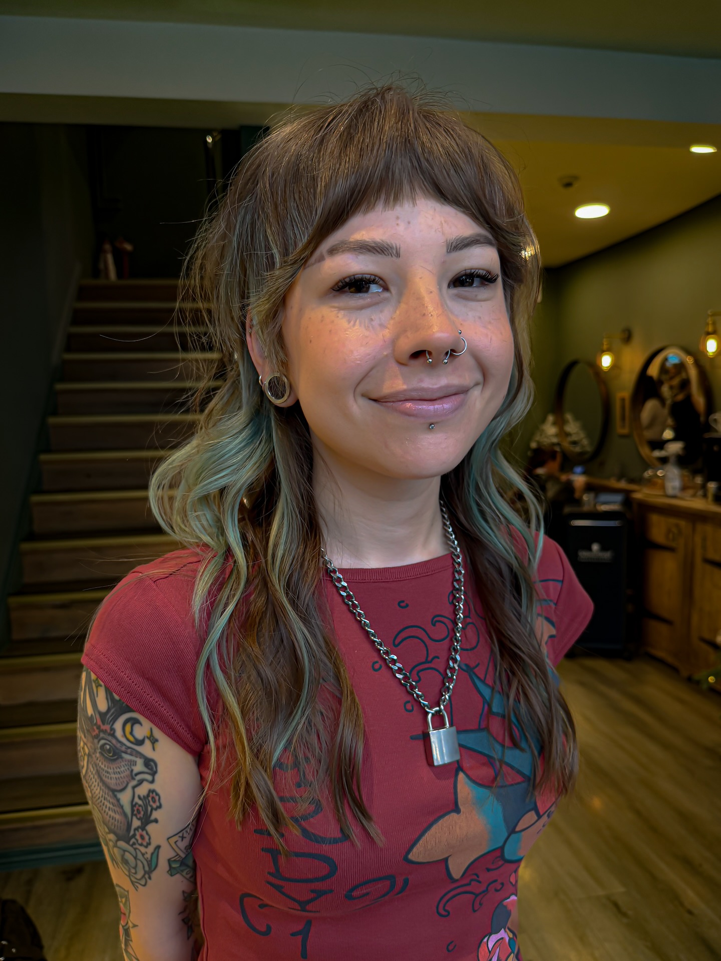 Trendy Choppy Layers with Teal Highlights