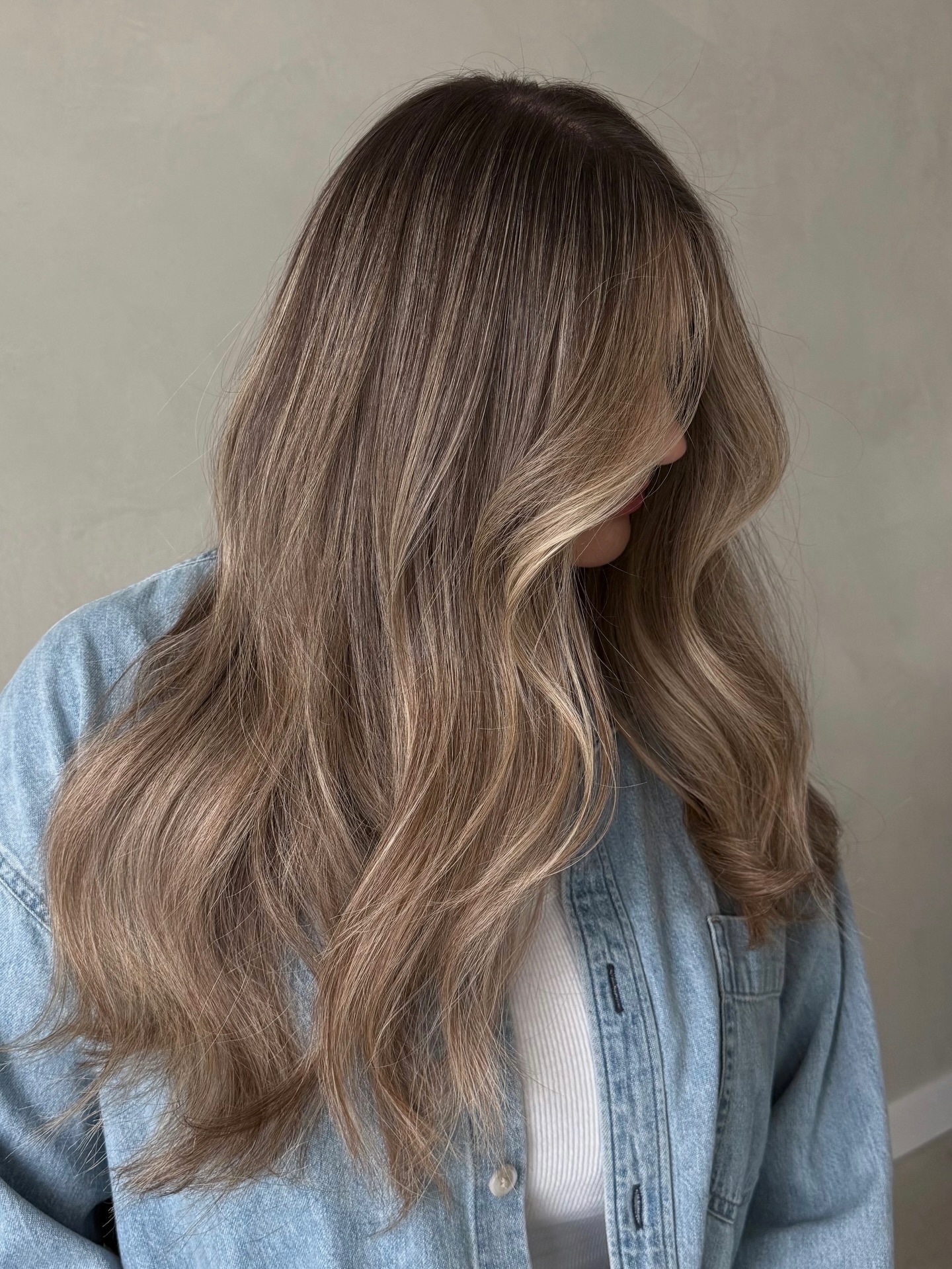 Beautifully Layered Long Wavy Cut with Balayage Highlights