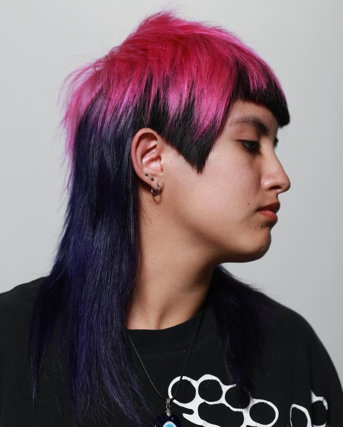 Bold Two-Tone Mullet with Dramatic Fringe