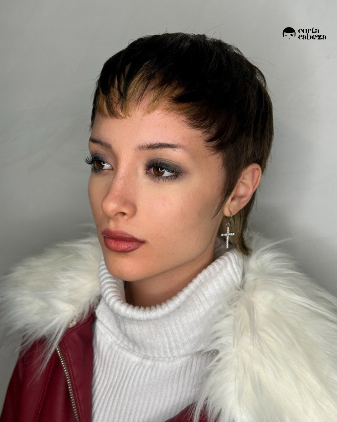Chic Textured Pixie Cut with Subtle Highlights