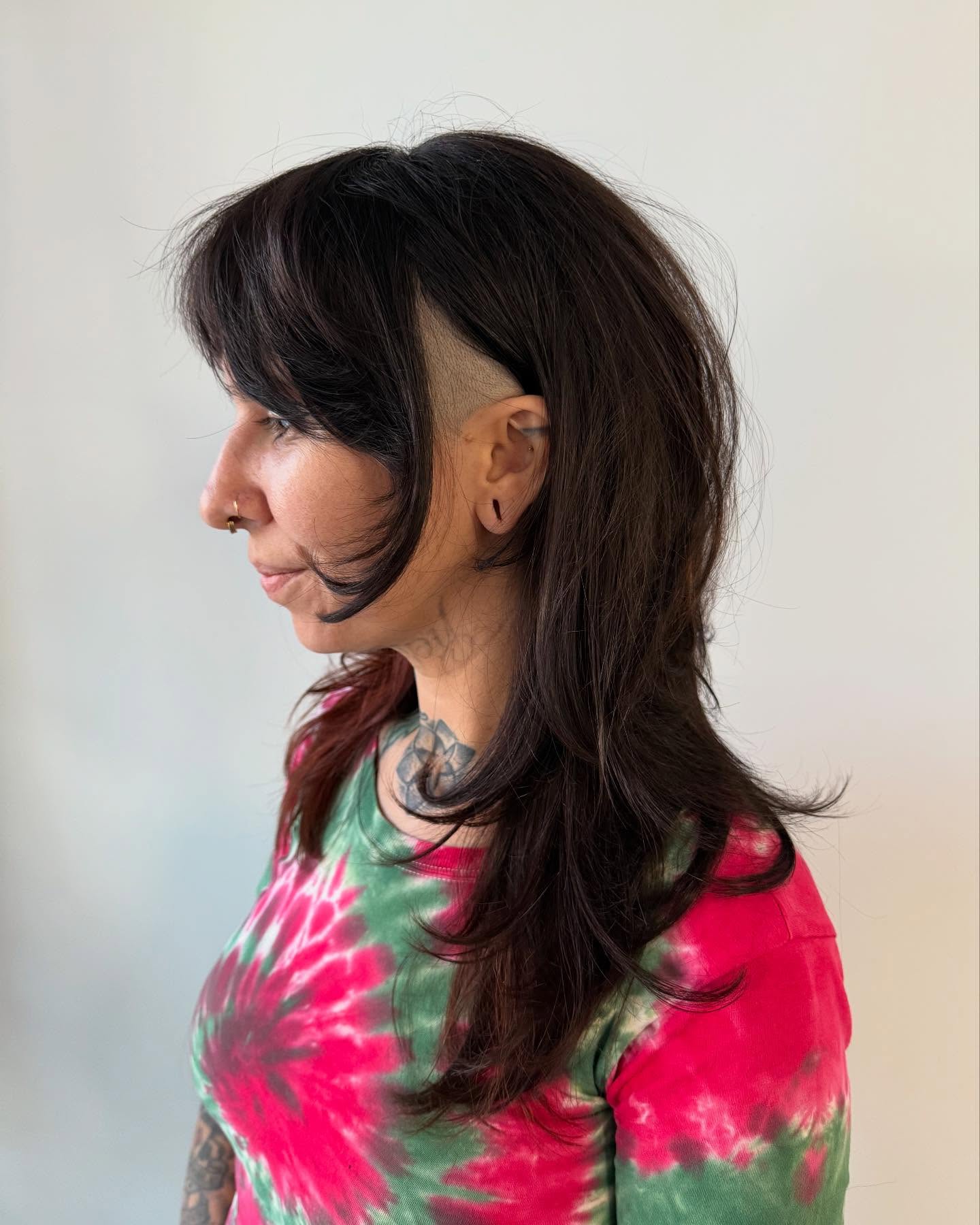 Edgy Layered Cut with Undercut and Long Face-Framing Pieces