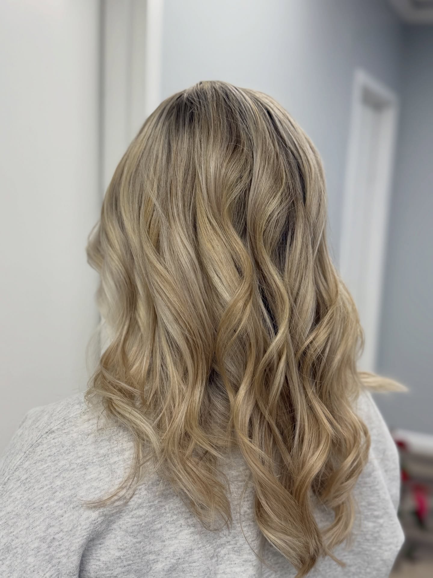 Soft Layered Waves with Subtle Balayage