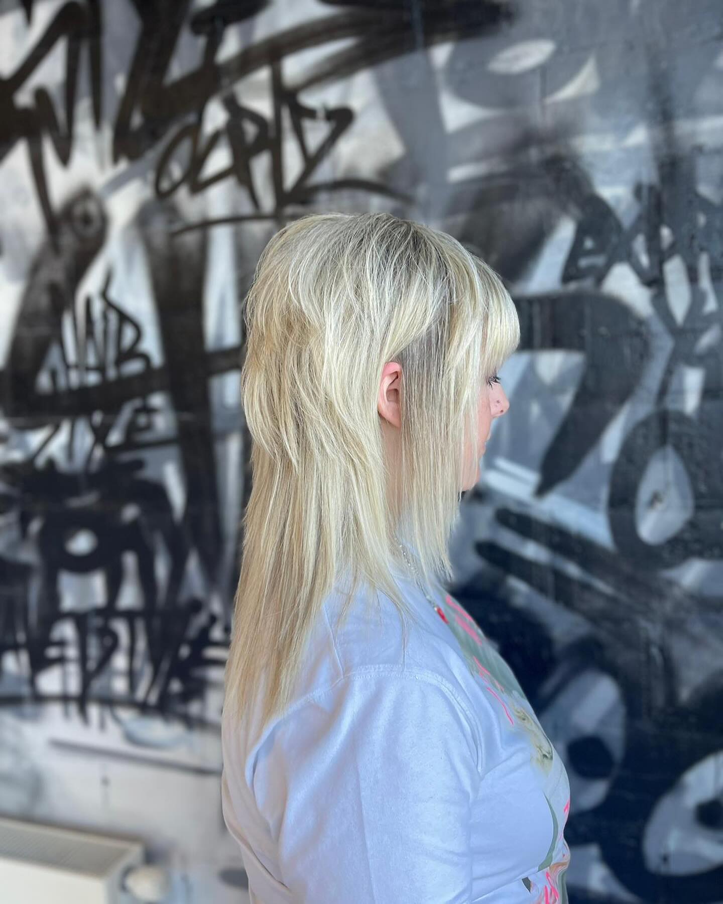 Trendy Soft Layered Mullet with Blunt Bangs