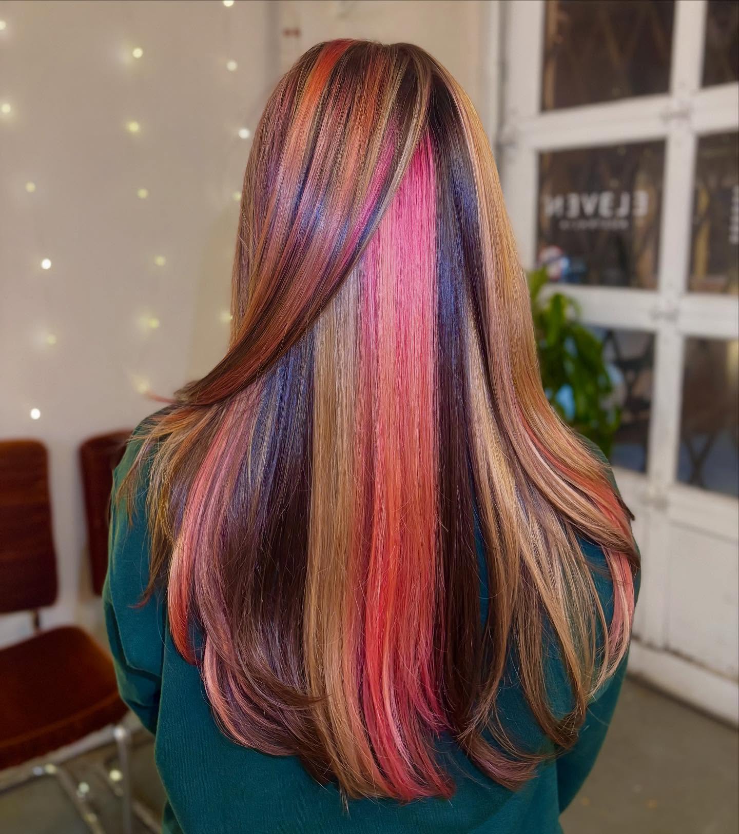 Bold Multicolored Straight Hair with Vibrant Highlights