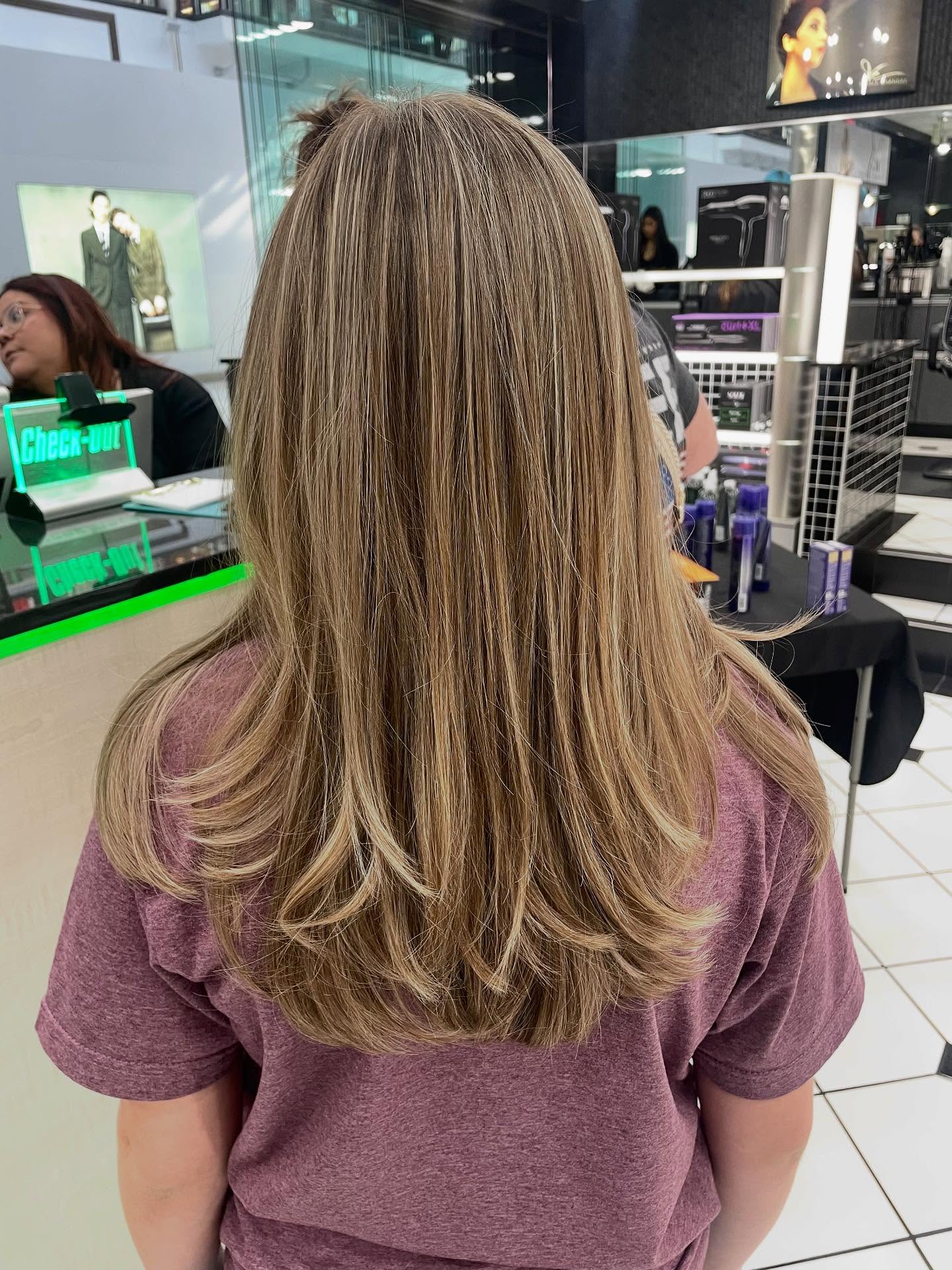 Lightly Layered Sun-Kissed Mid-Length Cut