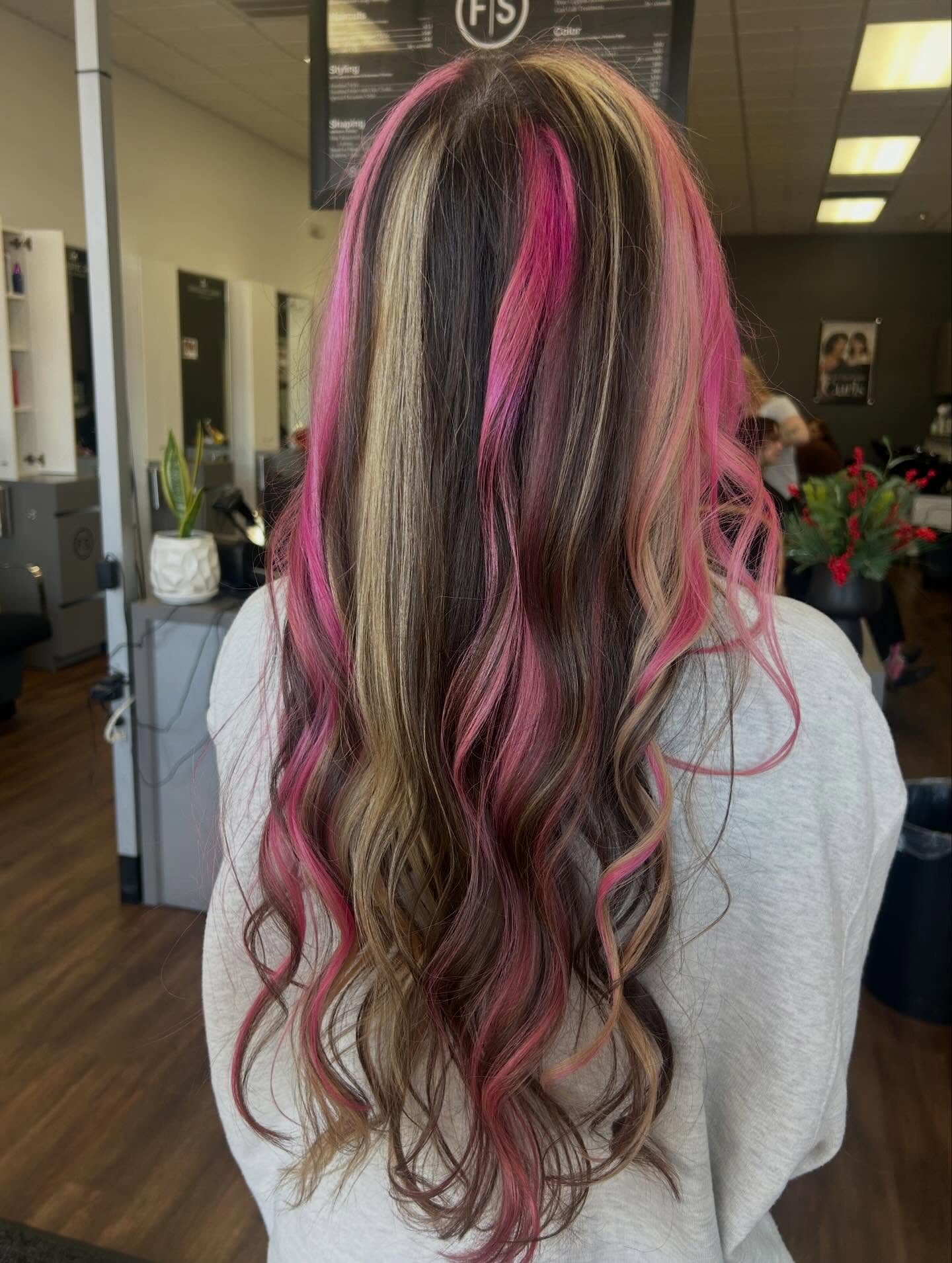 Playful Long Waves with Bold Pink and Blonde Highlights