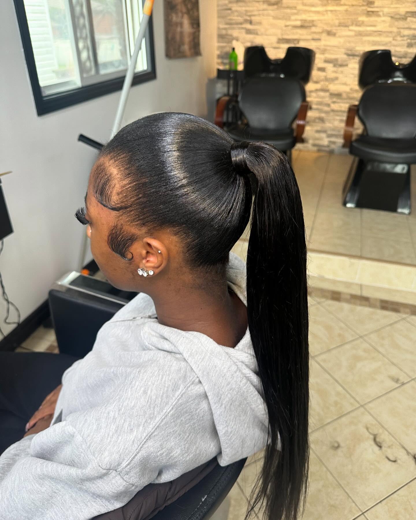 Sleek High Ponytail with Elegant Edges
