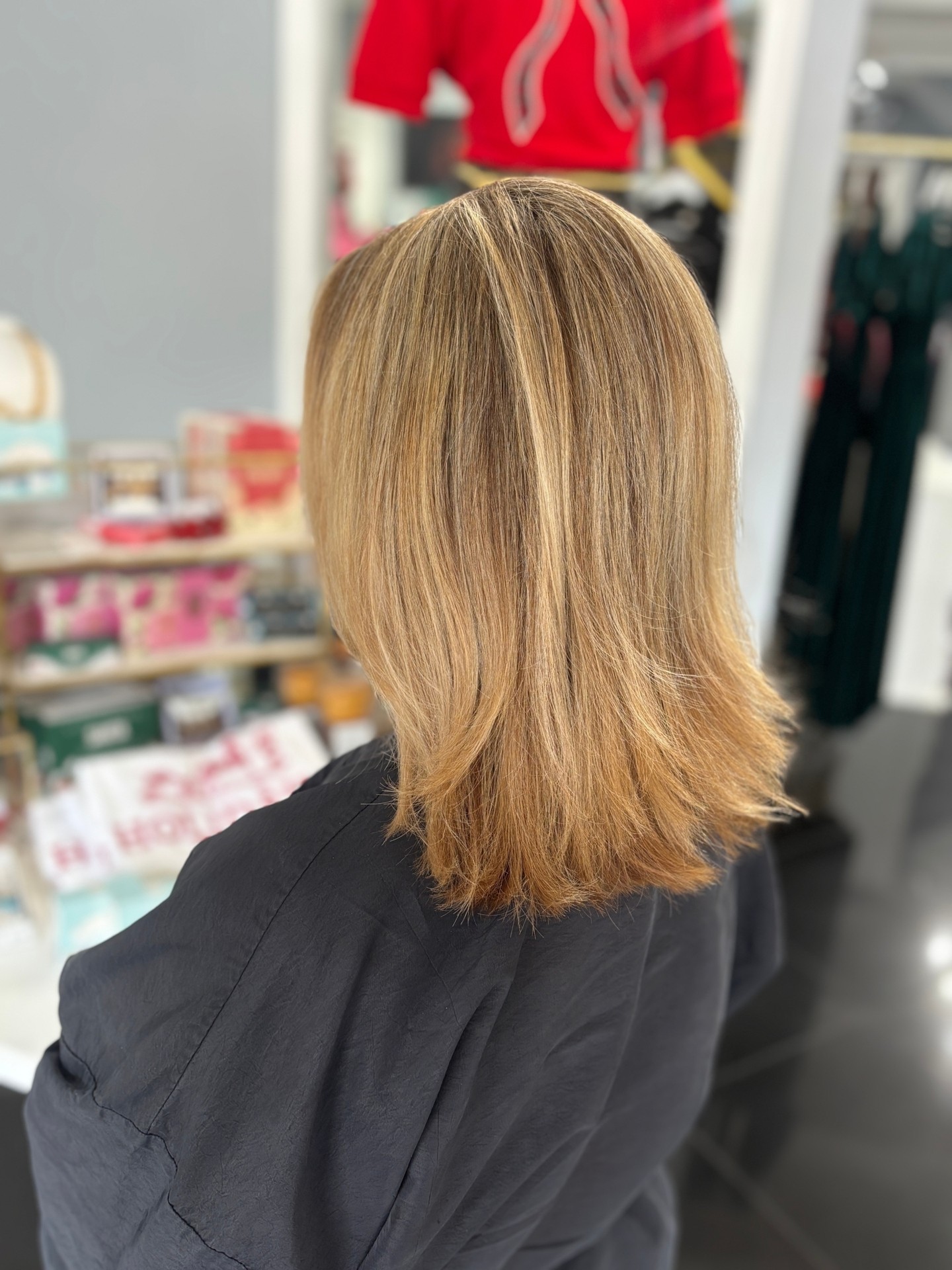 Softly Layered Sun-Kissed Mid-Length Cut