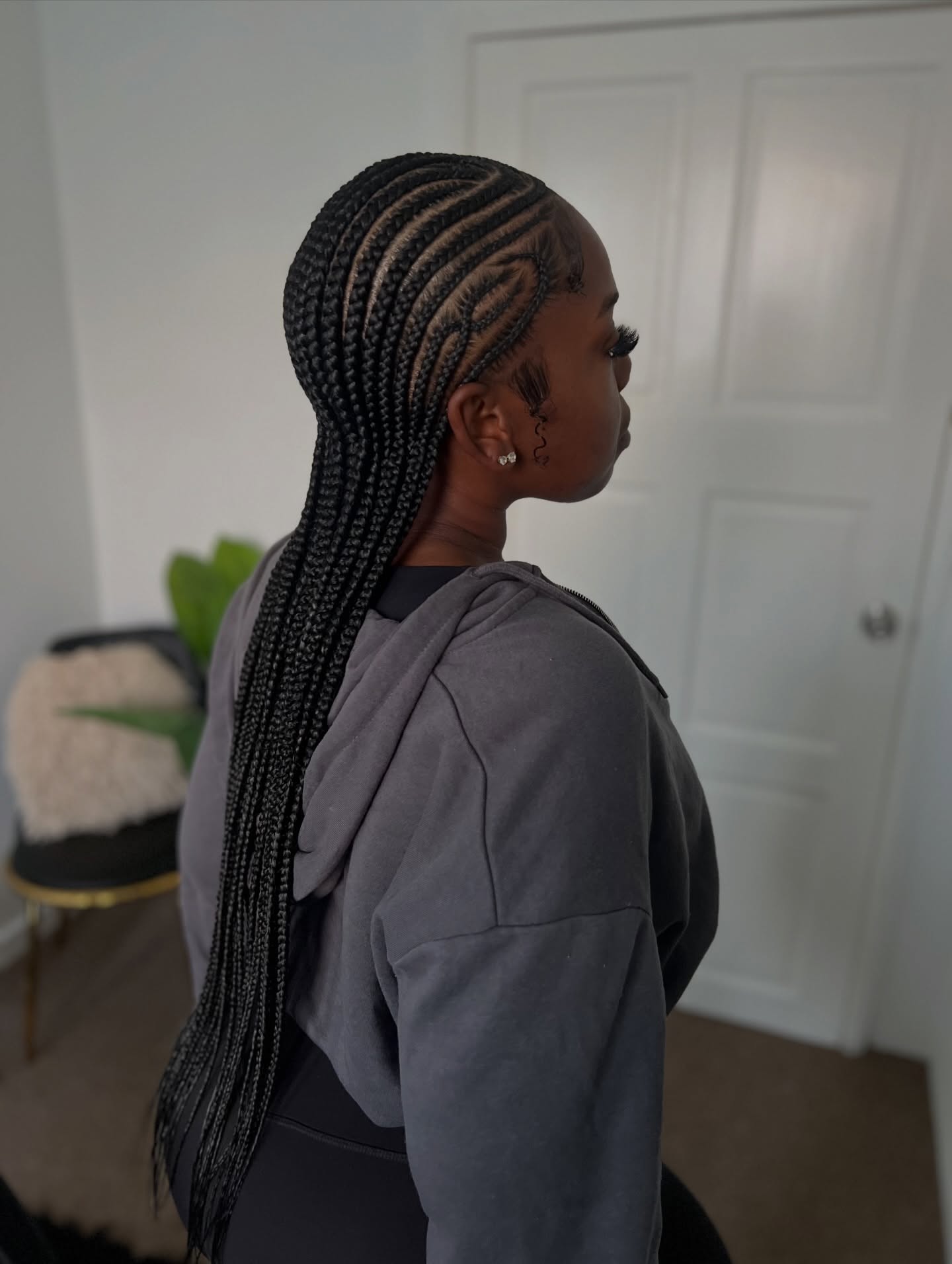 Stylish Long Box Braids with Intricate Cornrow Detailing