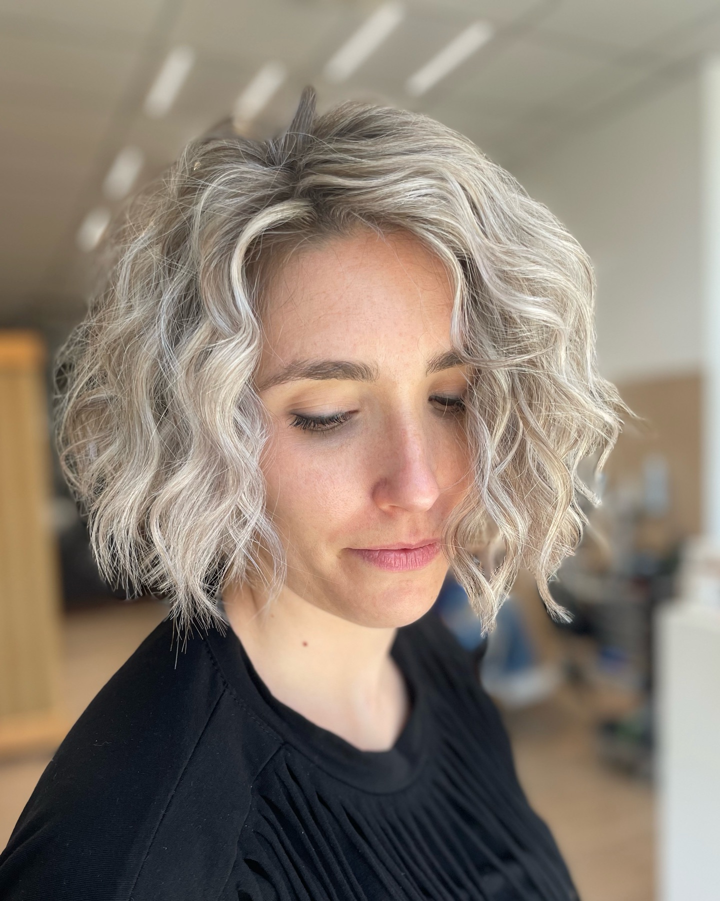 Textured Curly Bob with Light Platinum Highlights