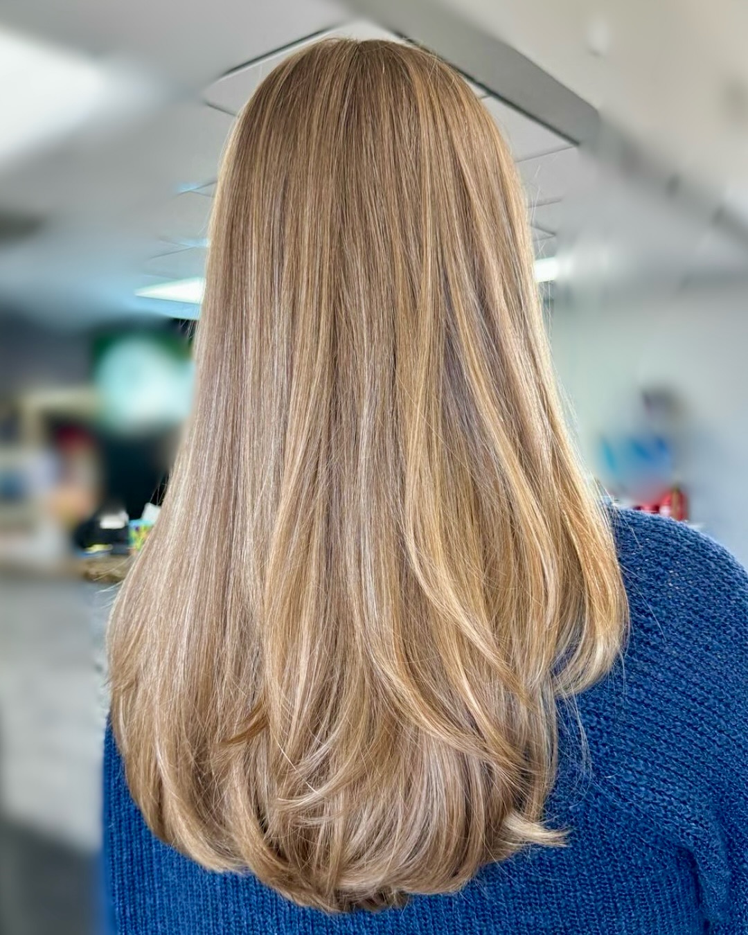 Elegant Long Layered Cut with Soft Waves
