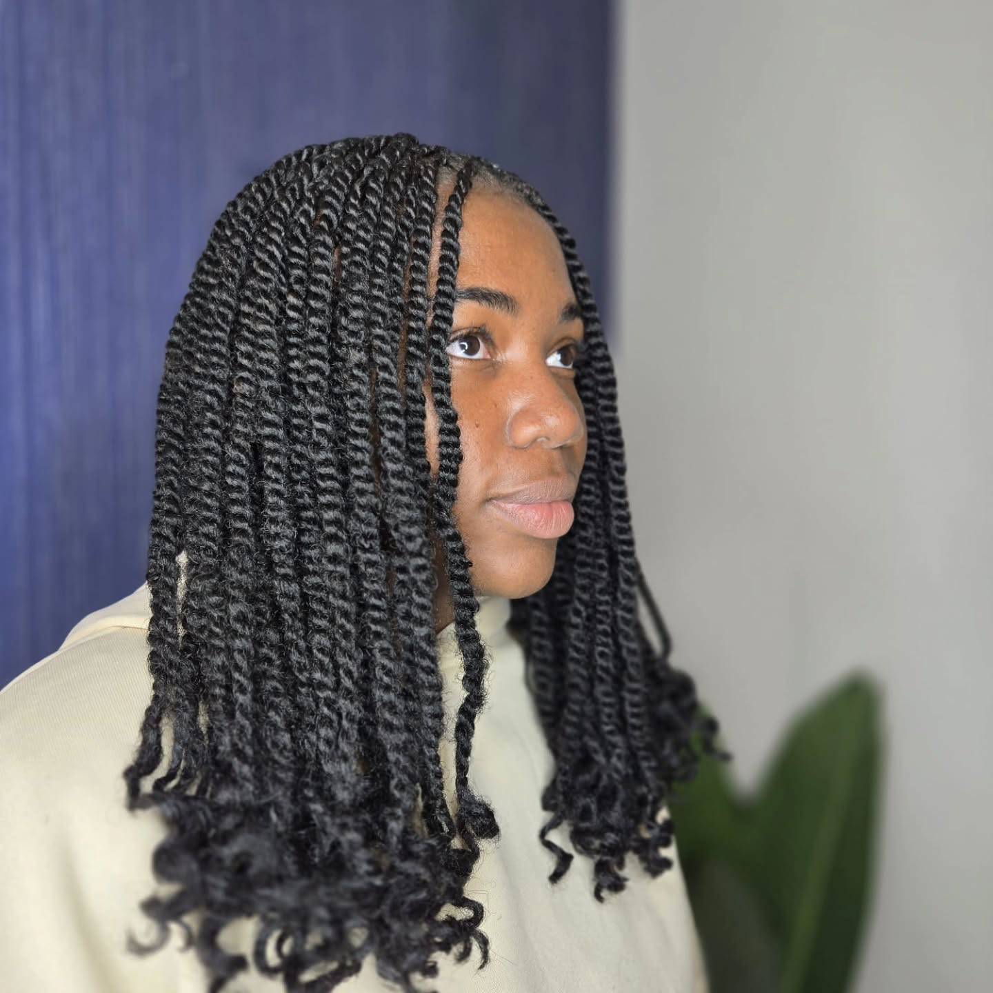 Elegant Twisted Mid-Length Hairstyle with Soft Curls