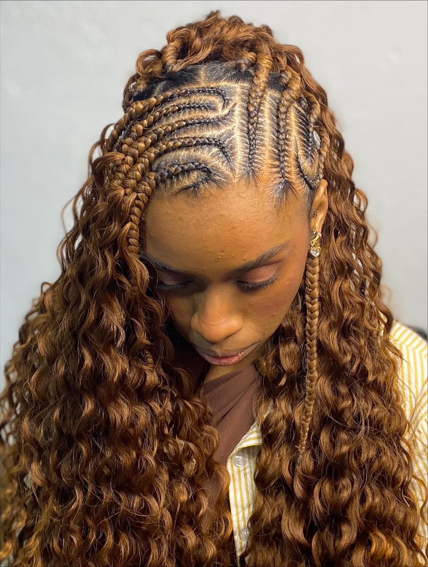 Intricate Braided Crown with Loose Curls