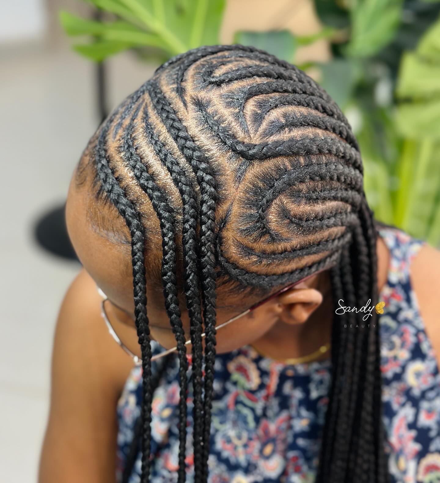 Intricate Wavy Cornrow Design with Long Box Braids