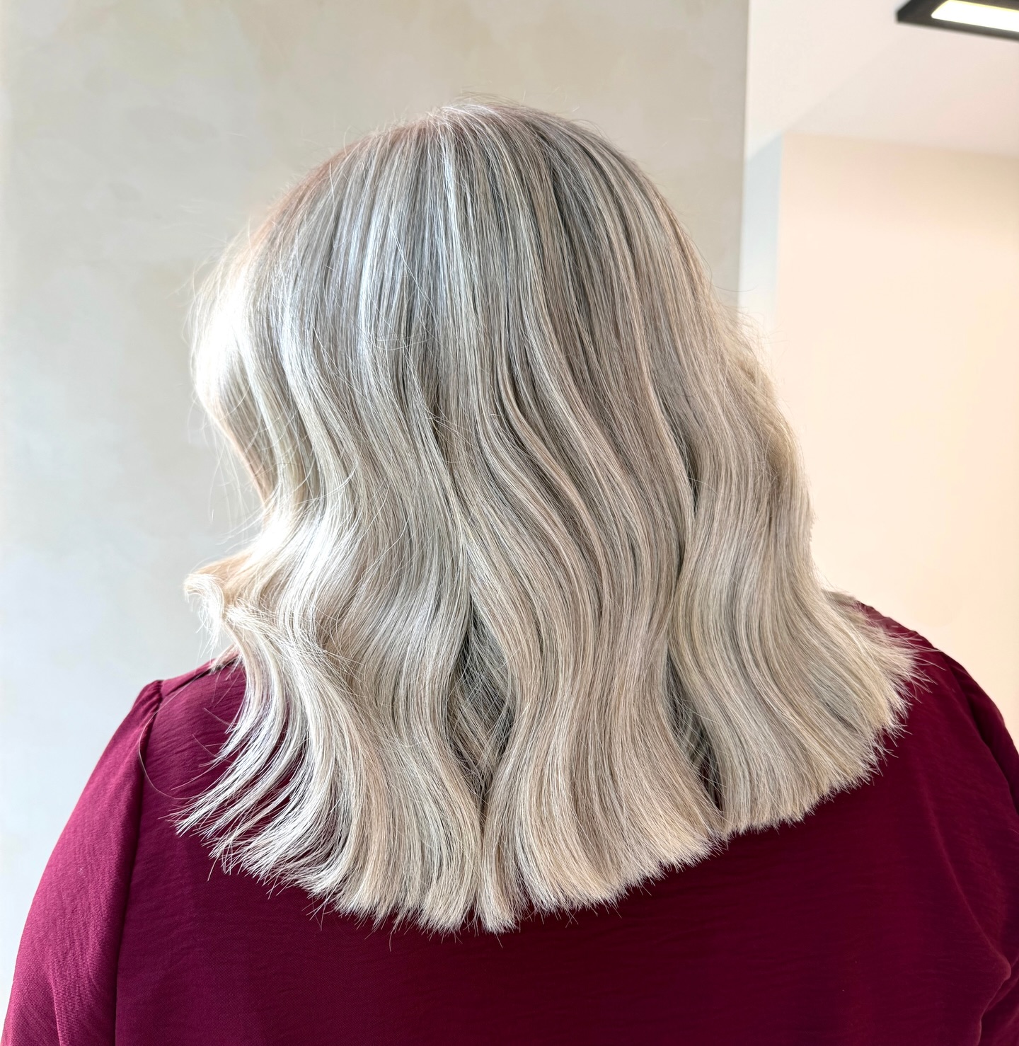 Elegant Soft Gray Waves with Subtle Blonde Highlights