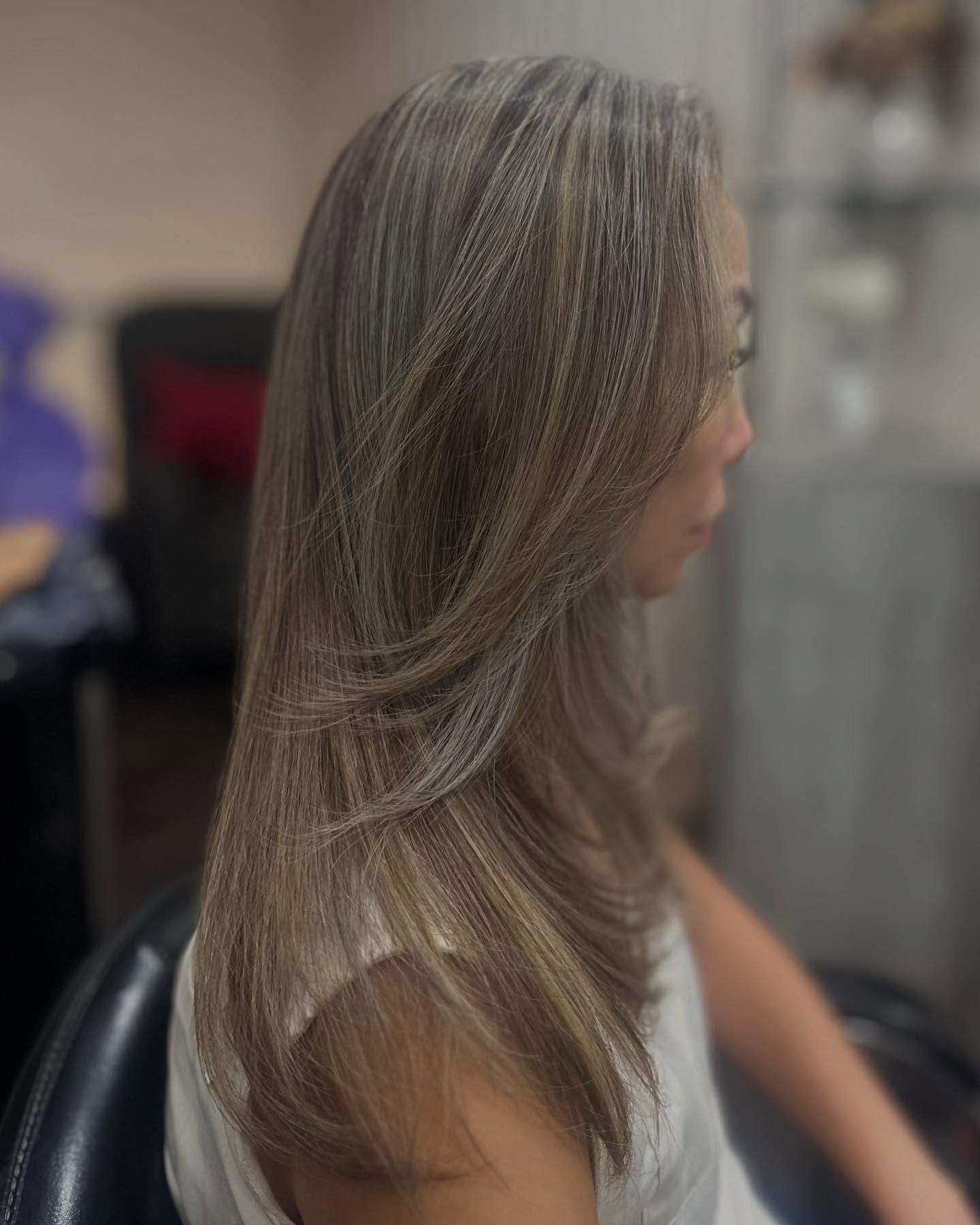 Stylish Long Layered Ash Blonde with Subtle Gray Highlights