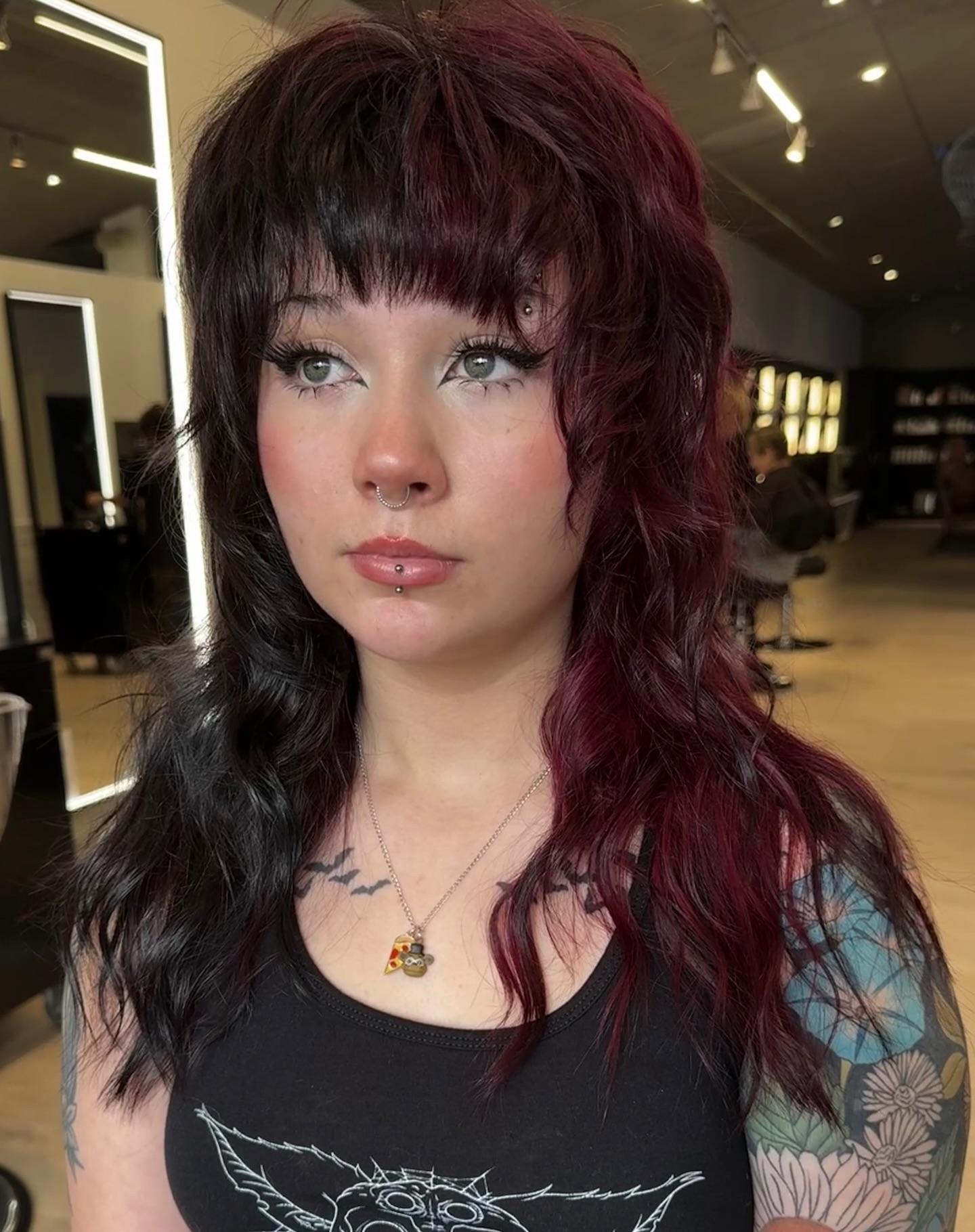 Bold Two-Toned Wavy Cut with Face-Framing Bangs