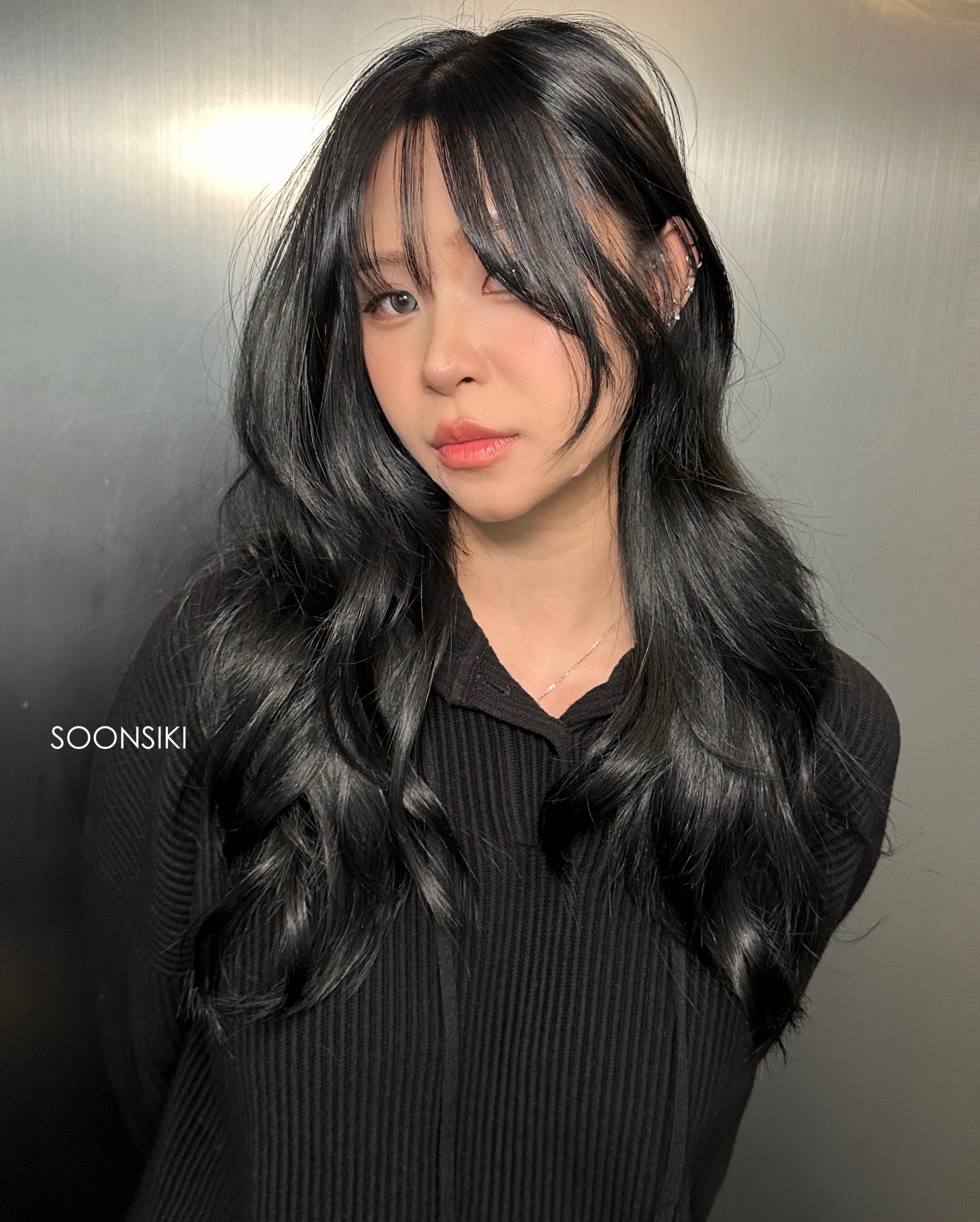 Elegant Long Layers with Whispy Bangs