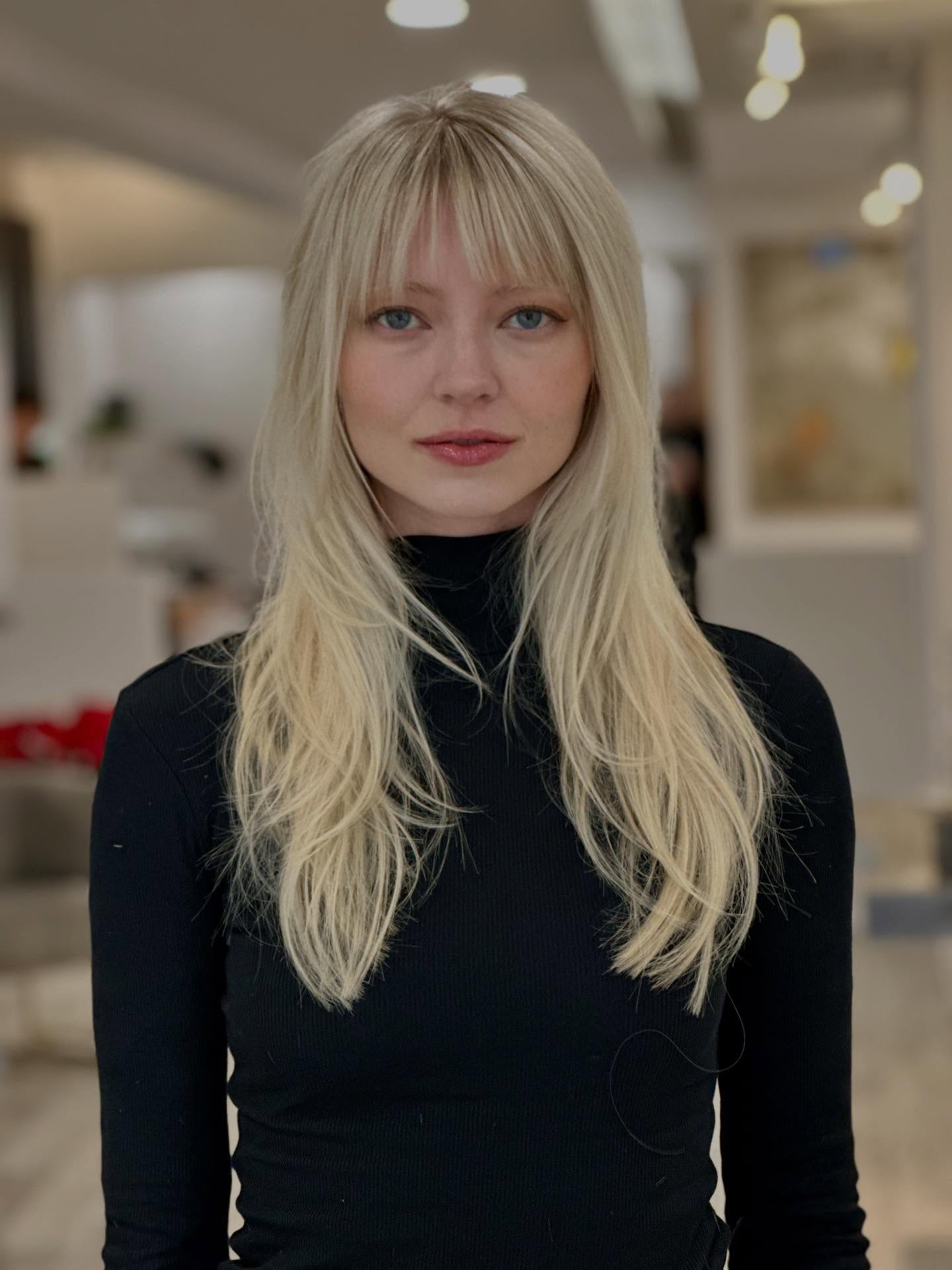 Long Layered Haircut with Whispy Bangs