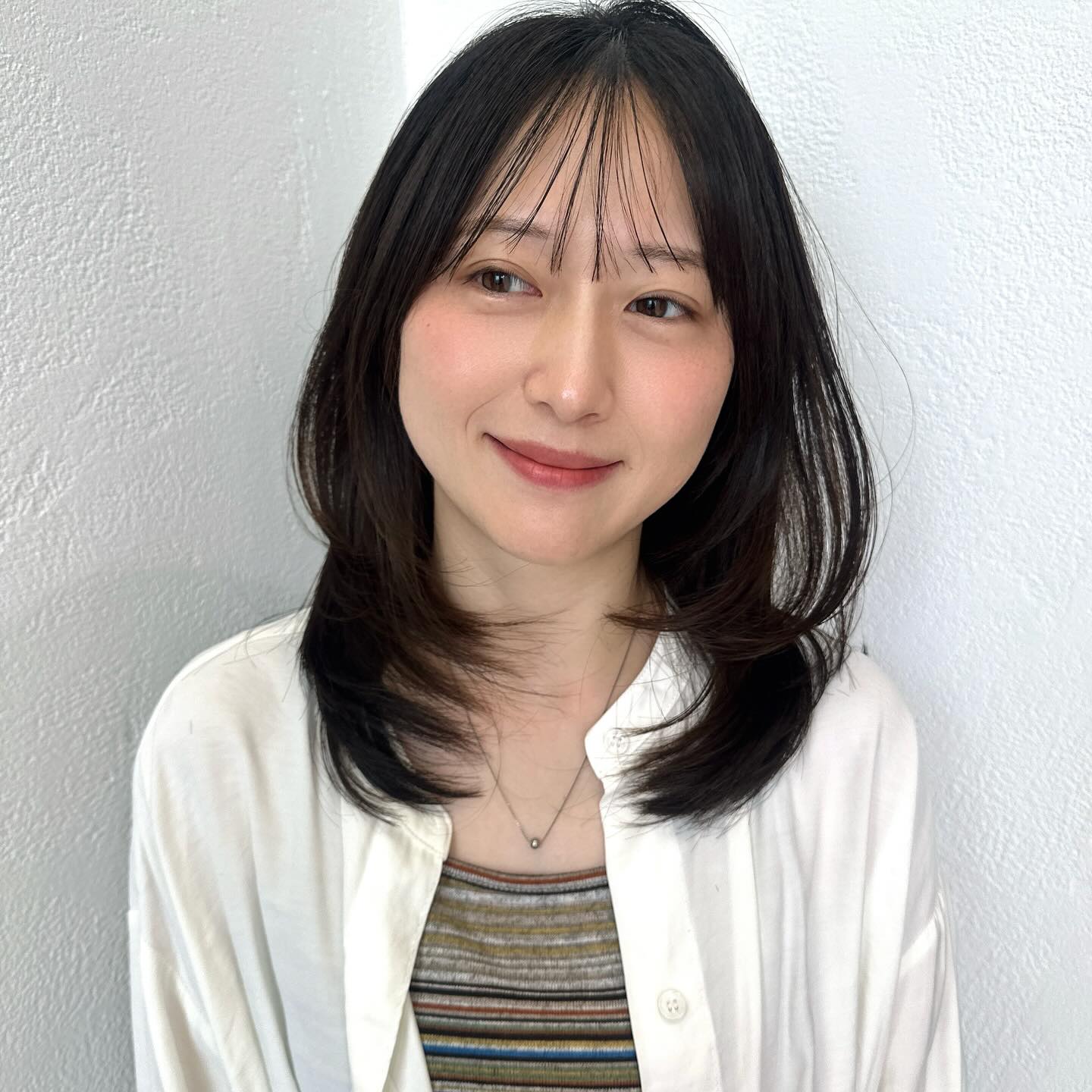 Modern Long Cut with Whispy Bangs