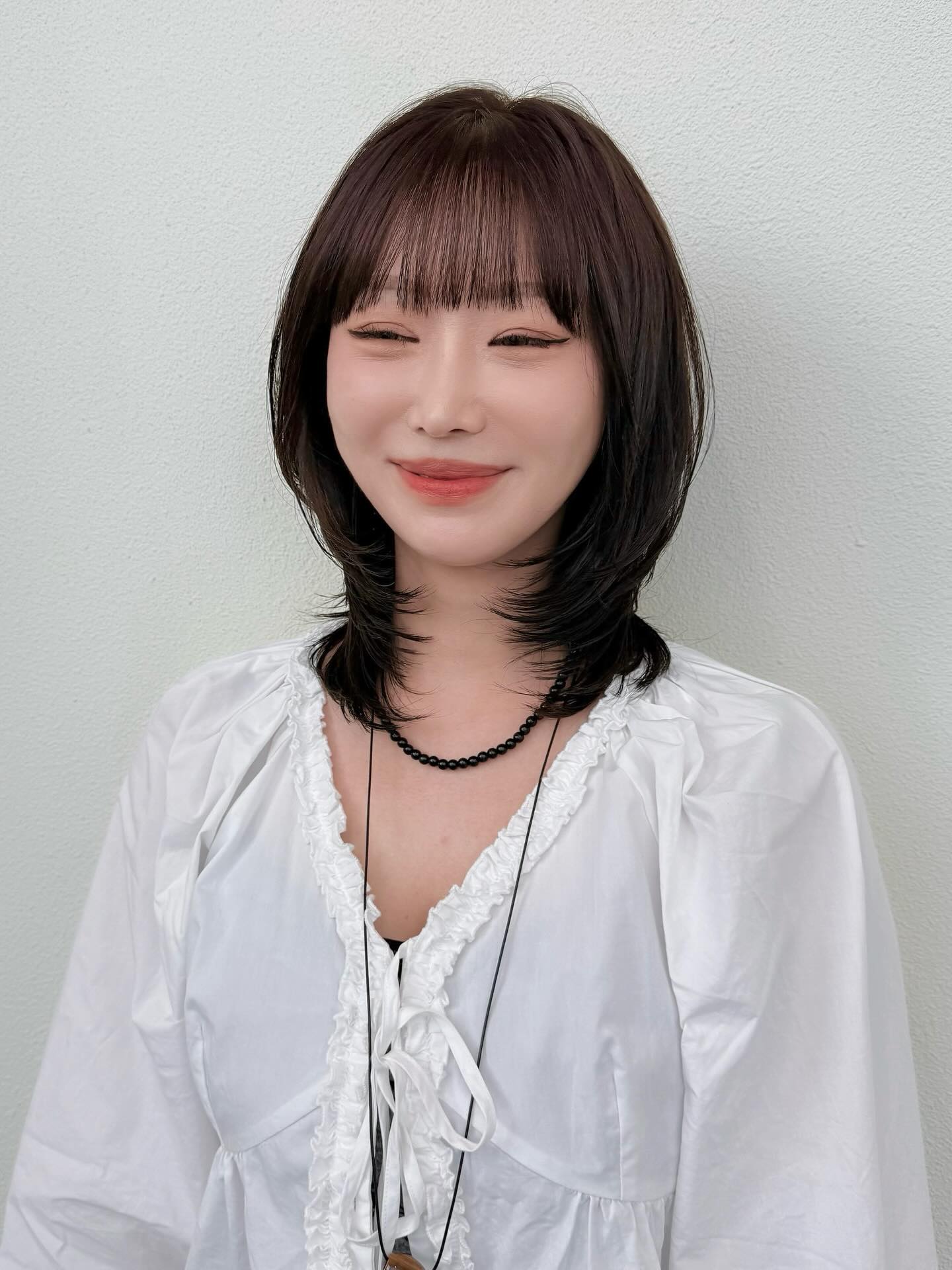 Modern Textured Cut with Whispy Bangs