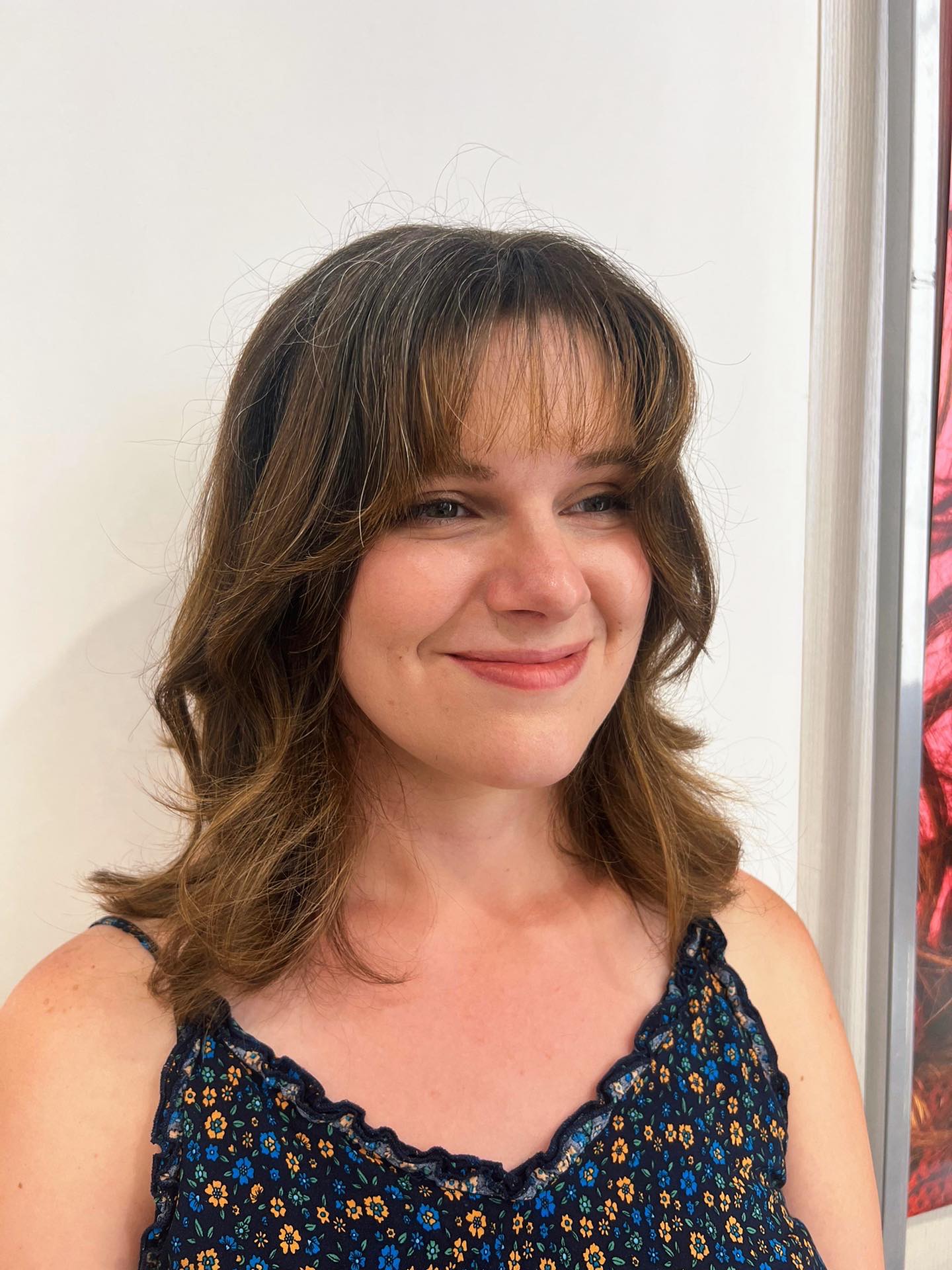Playful Mid-Length Cut with Whispy Bangs