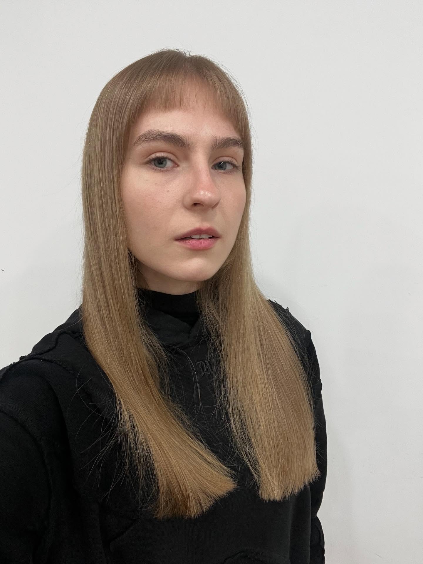 Sleek Long Hair with Whispy Bangs