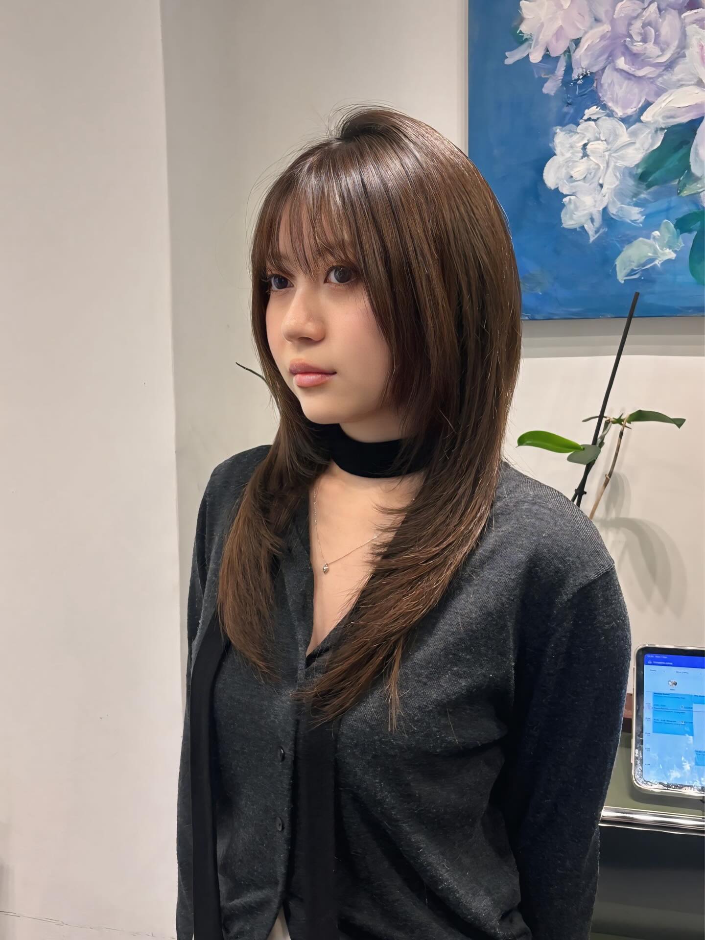 Sleek Mid-Length Cut with Wispy Bangs