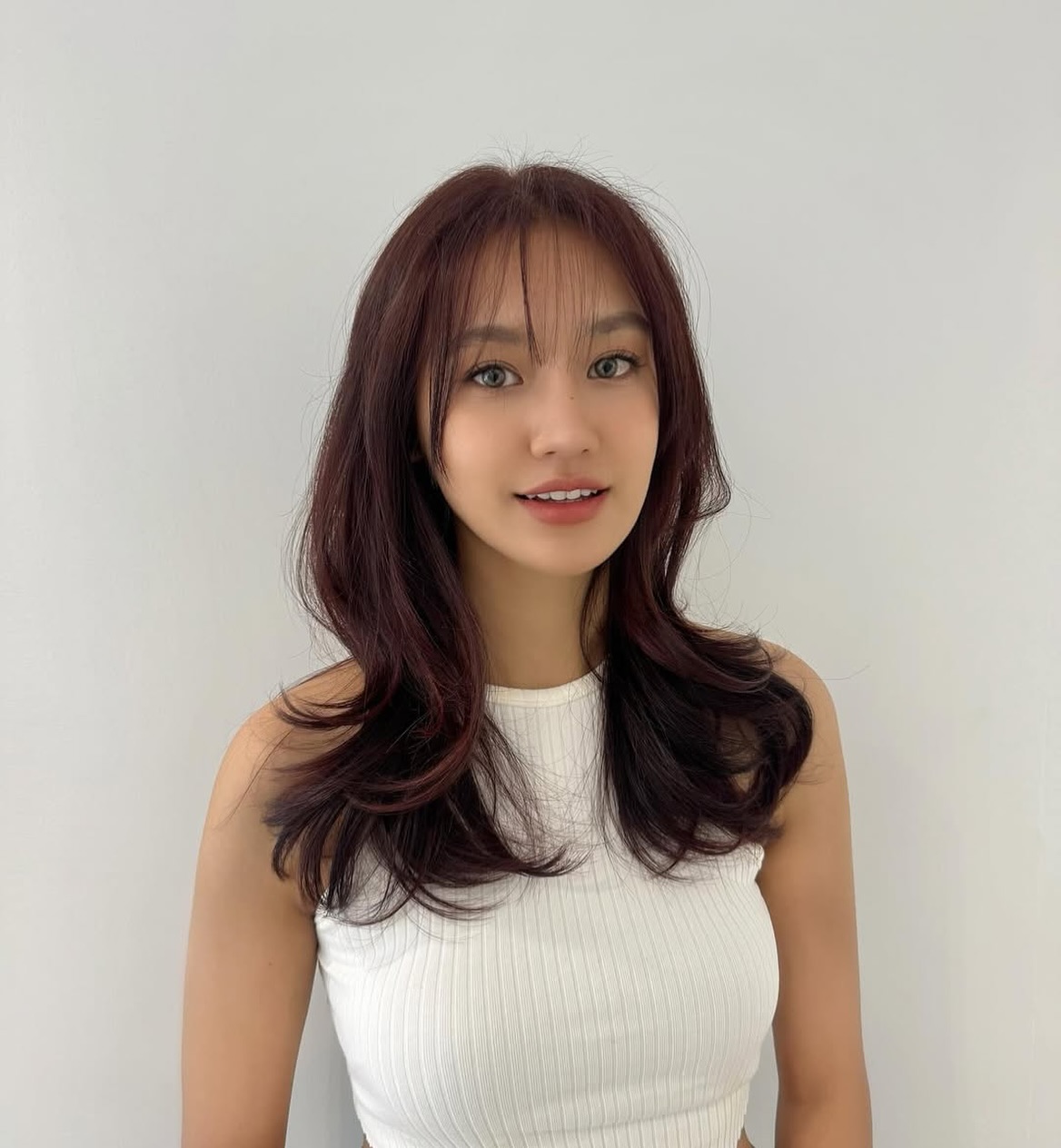 Trendy Long Layers with Whispy Bangs