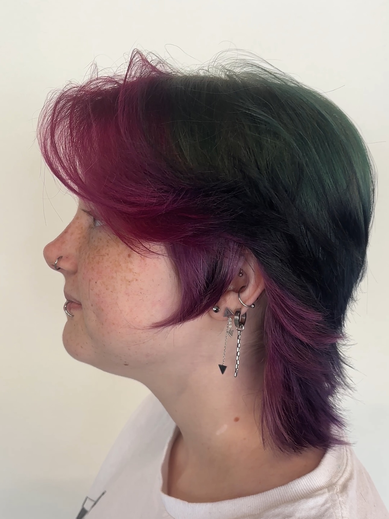 Bold Asymmetrical Cut with Vibrant Color Accents