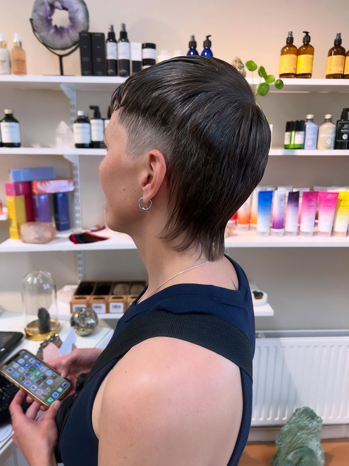 Edgy Textured Bob with Undercut and Soft Waves