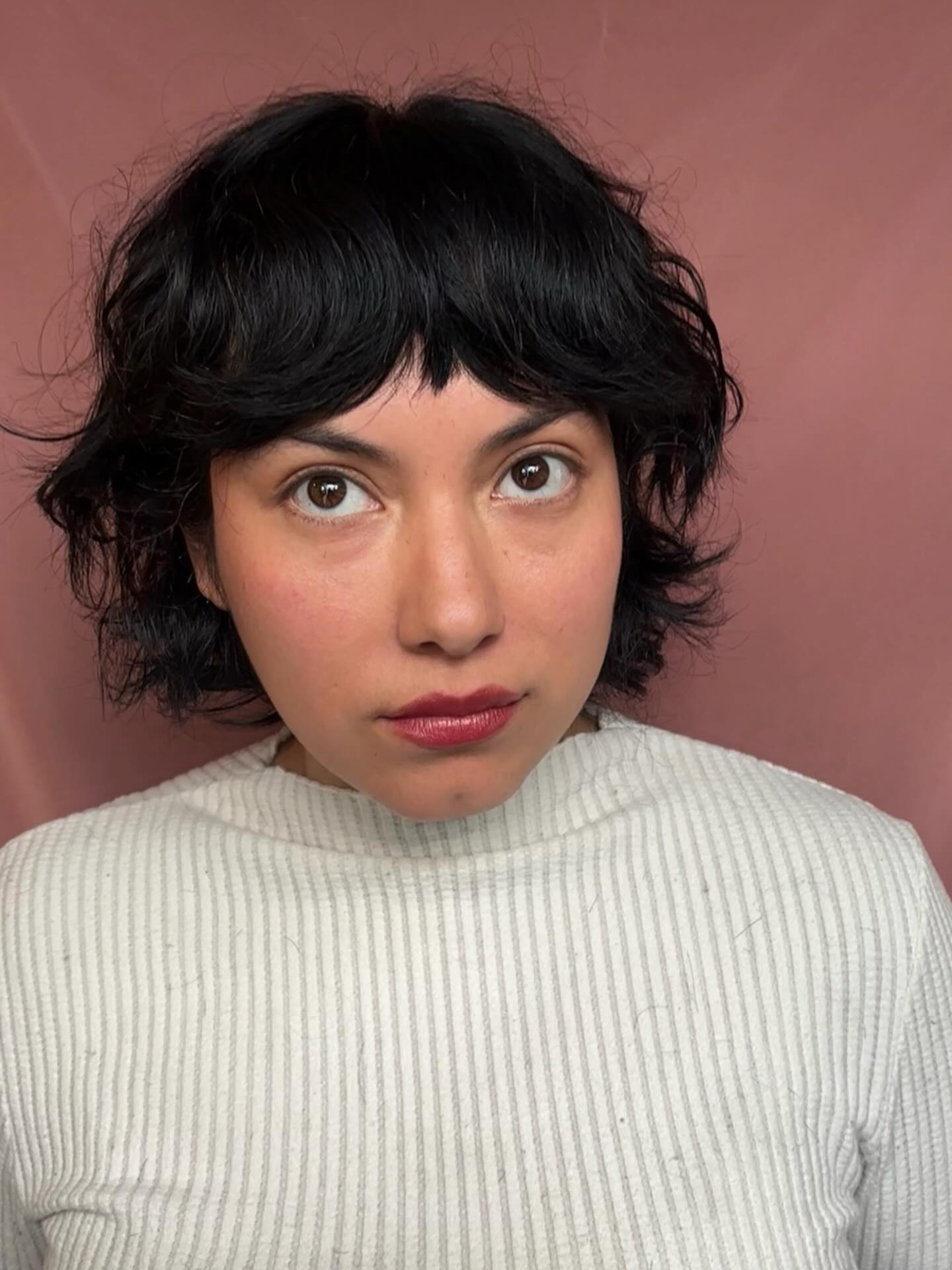 Playful Textured French Bob with Defined Curls