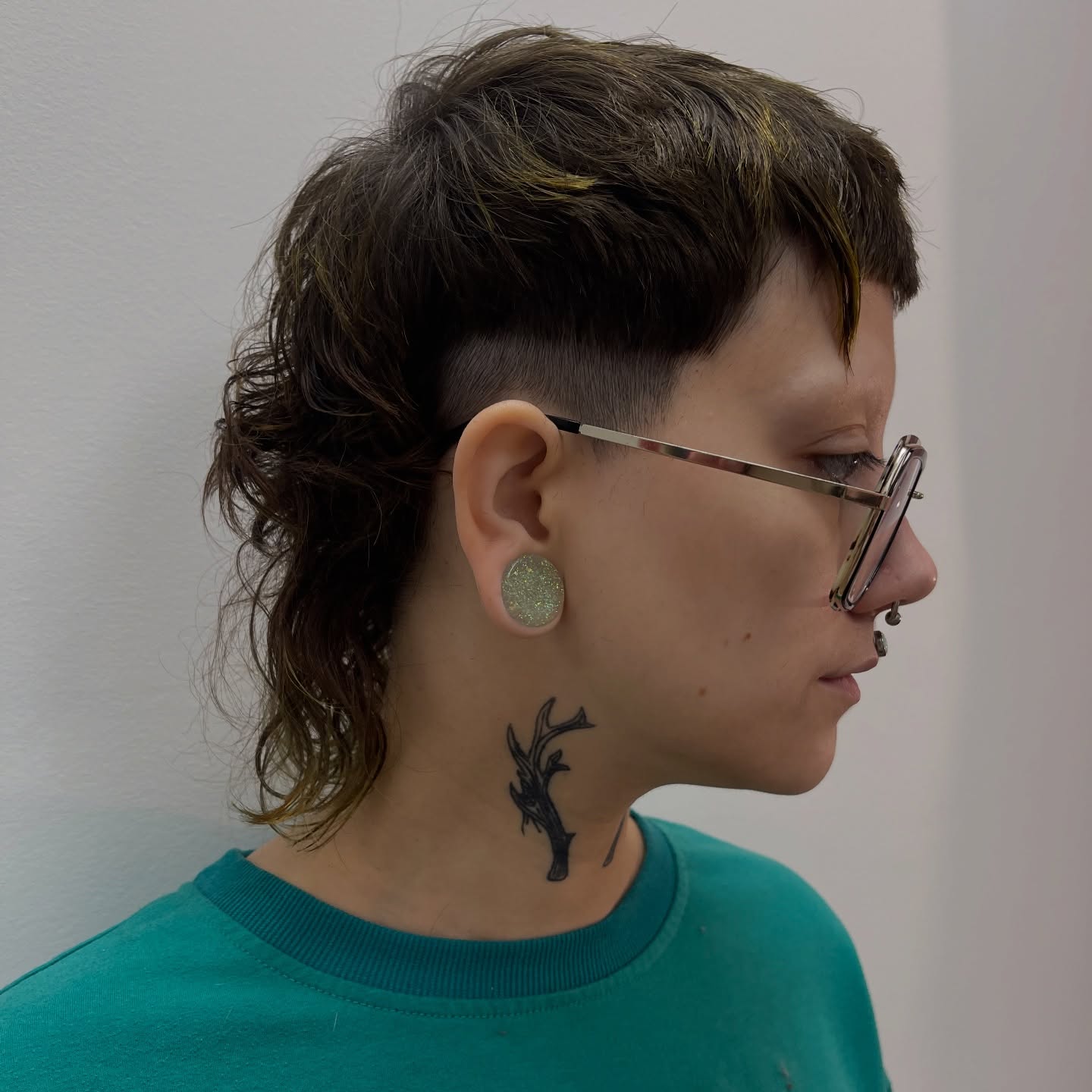 Trendy Textured Mullet with Subtle Green Highlights