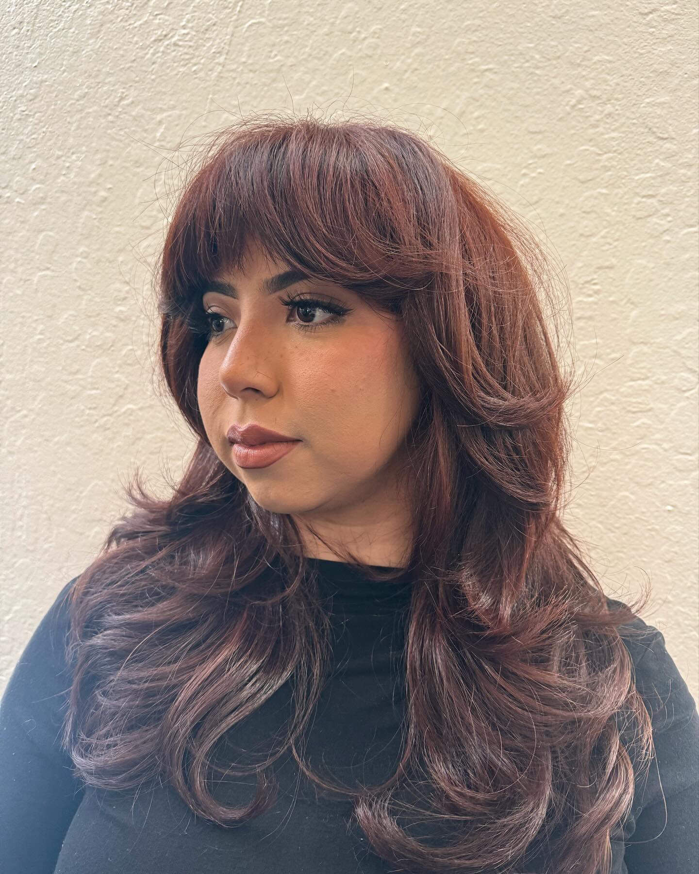 Elegant Mahogany Cowgirl Cut with Face-Framing Layers