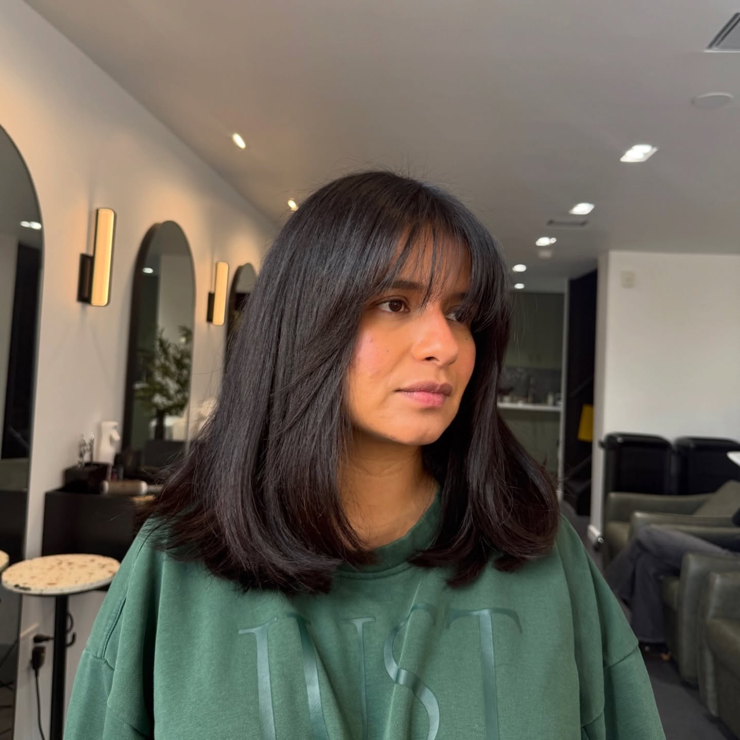 Sleek Mid-Length Lob with Soft Curtain Bangs