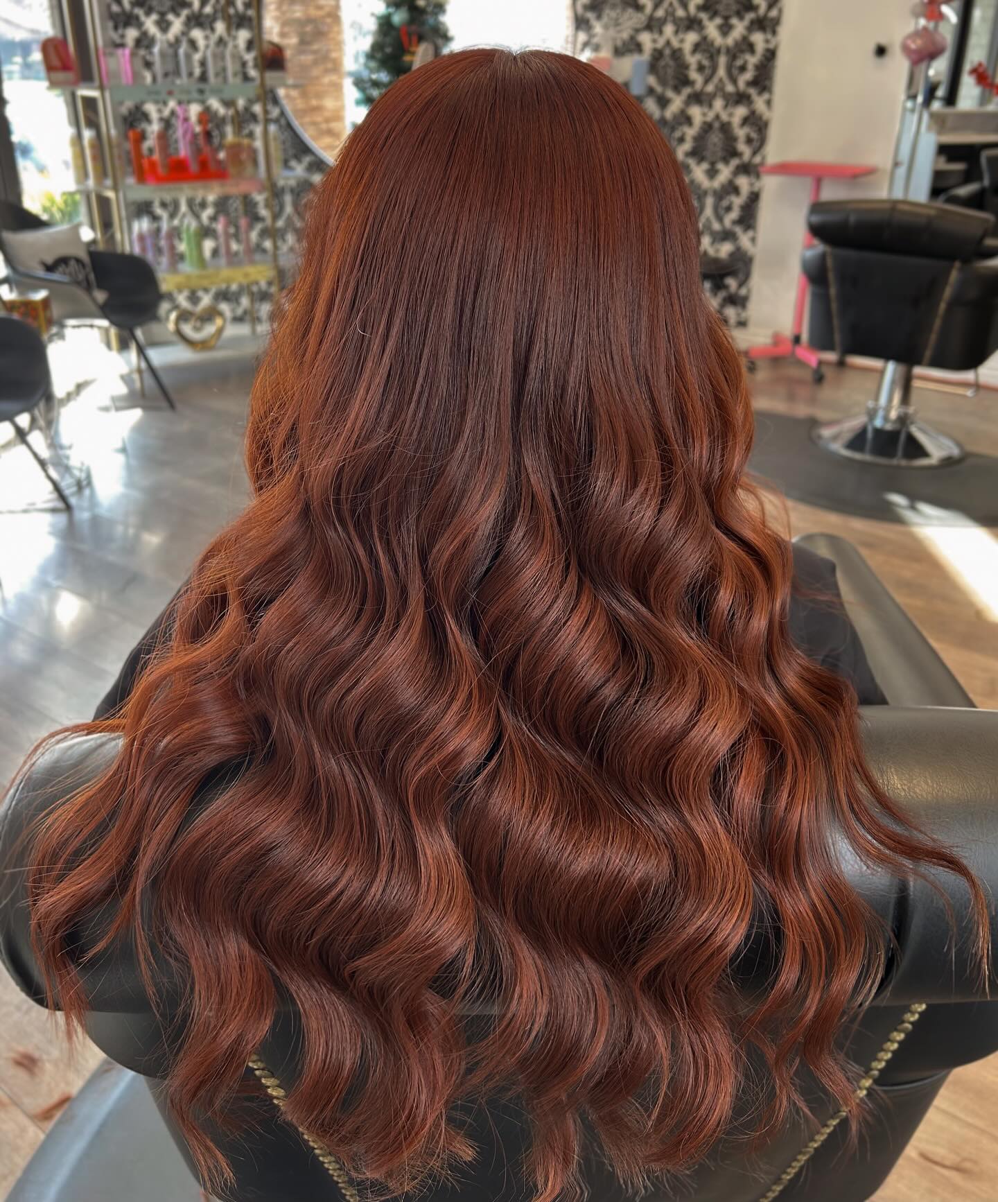 Warm Auburn Layered Cowgirl Cut with Soft Waves