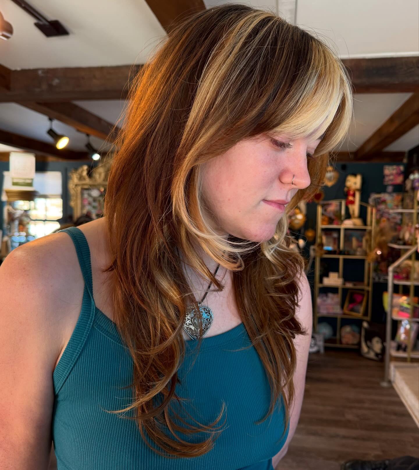 Modern Shag Cut with Light Blonde Face-Framing Highlights
