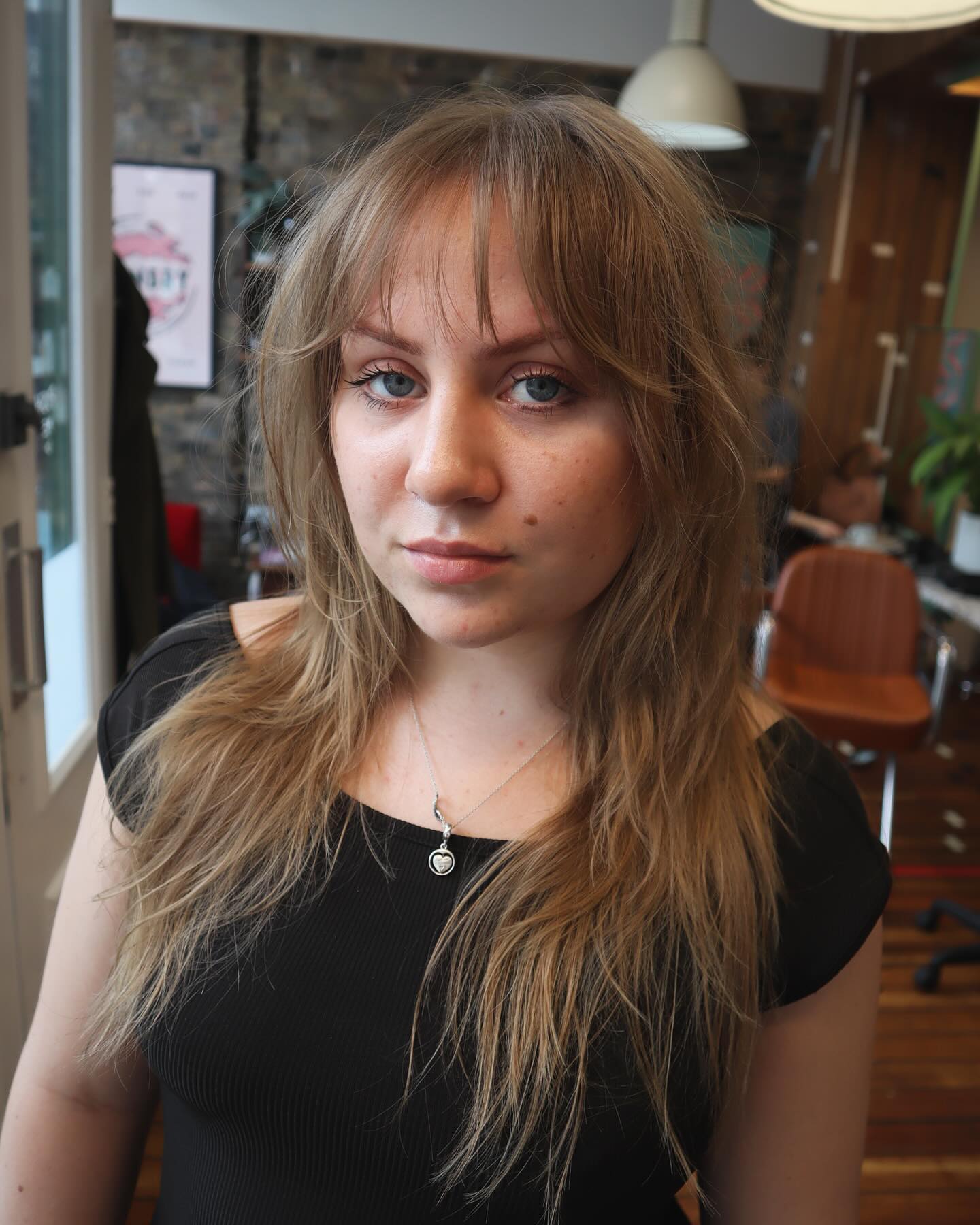 Modern Shag Cut with Wispy Bangs